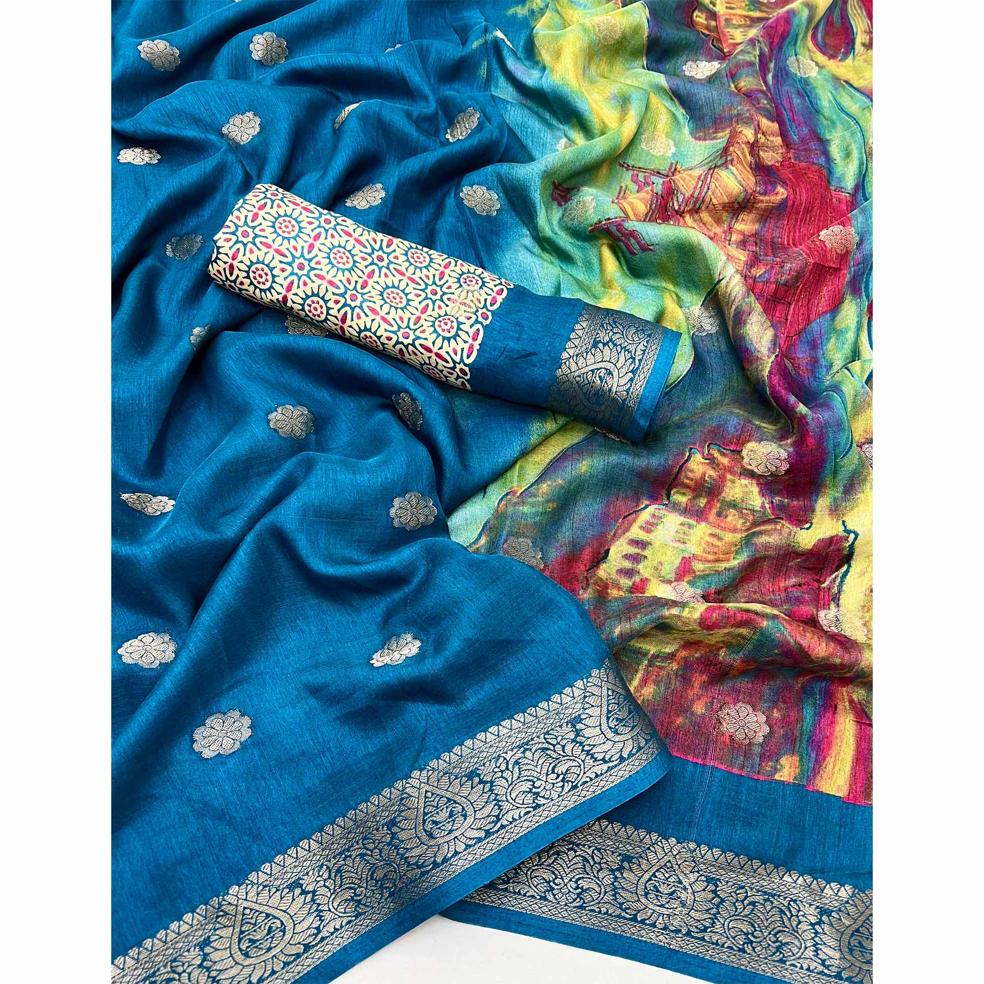 Soft Dola Silk Saree in Teal Glows with Intricate Floral Butti Weaving