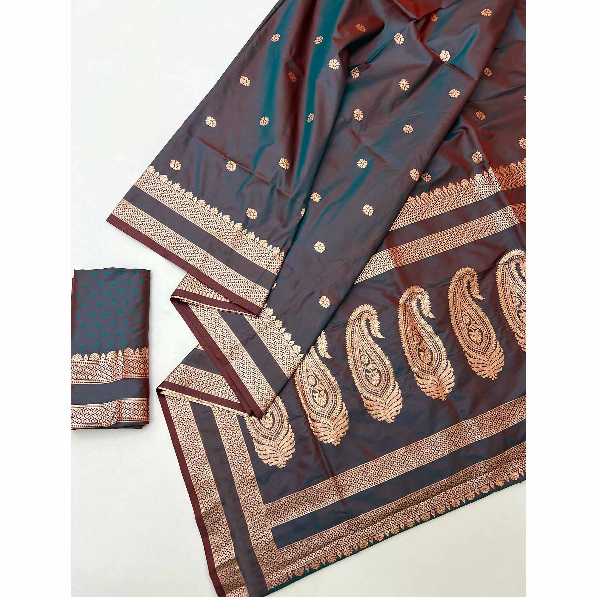 Teal Green Ornate Floral Zari Weaving Work Silk Blend Saree With Festive Shine