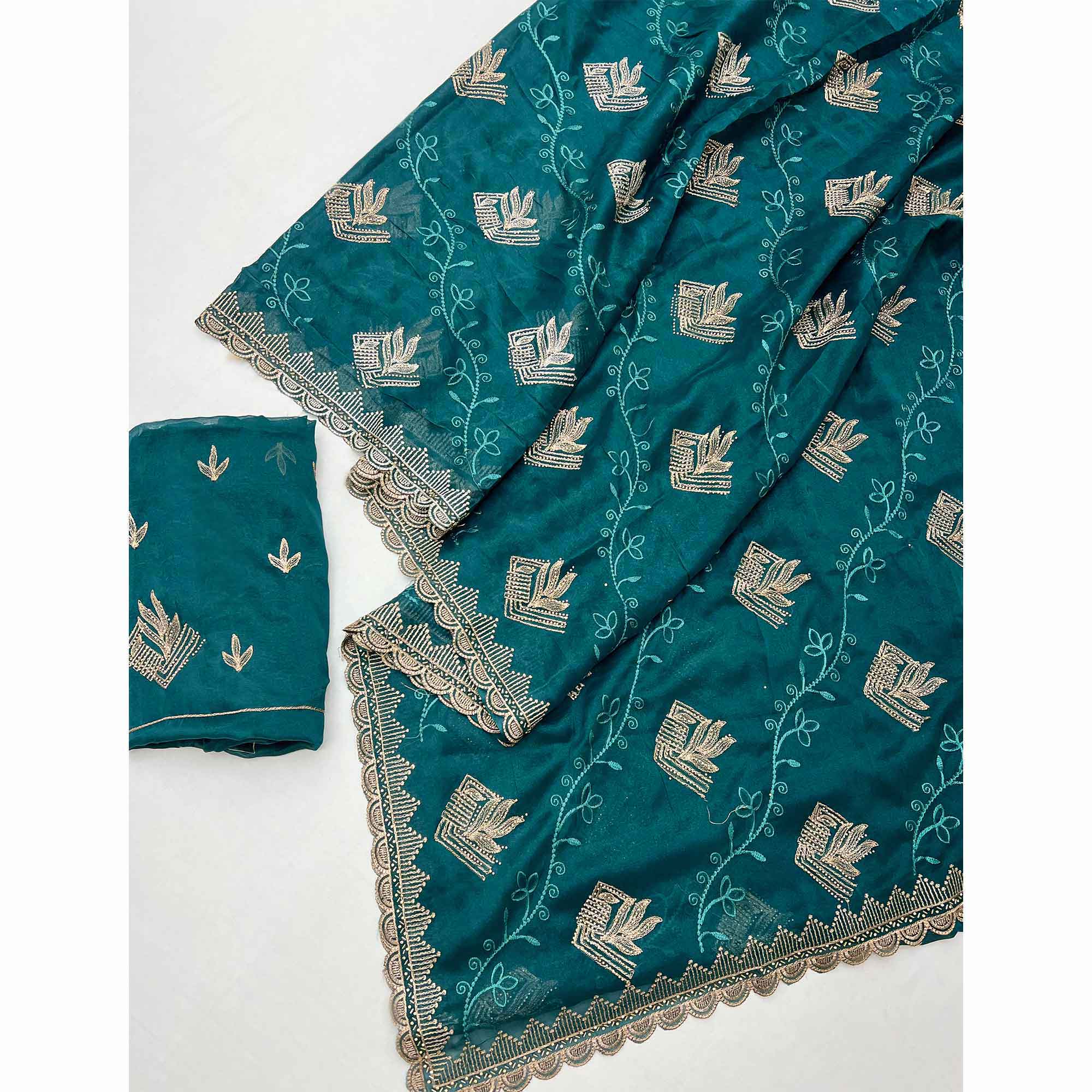 Elegant Teal Georgette Saree Accented With Intricate Floral Thread Embroidery