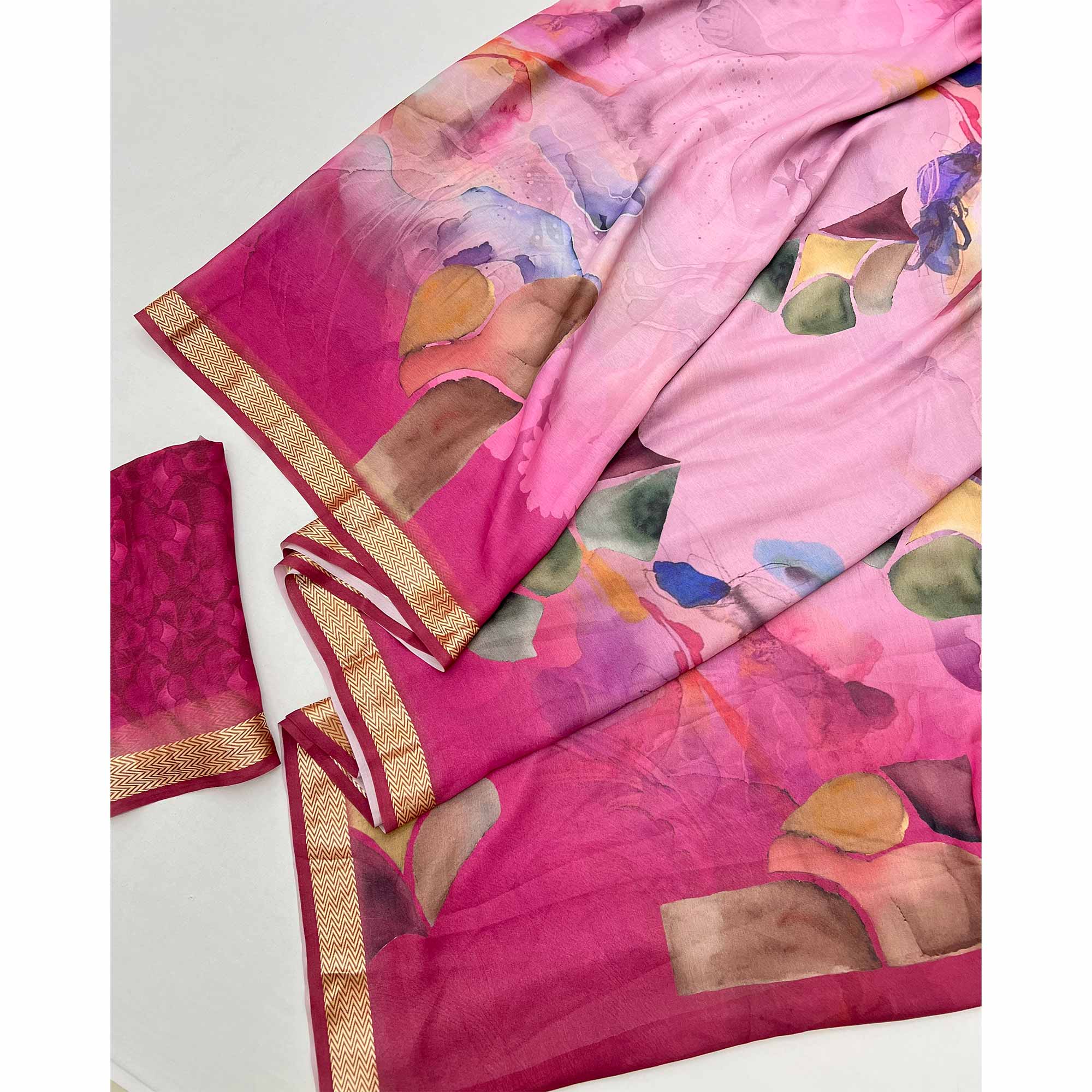 Graceful Rani Pink Georgette Saree Accented With Digital Prints & Viscose Border Finish