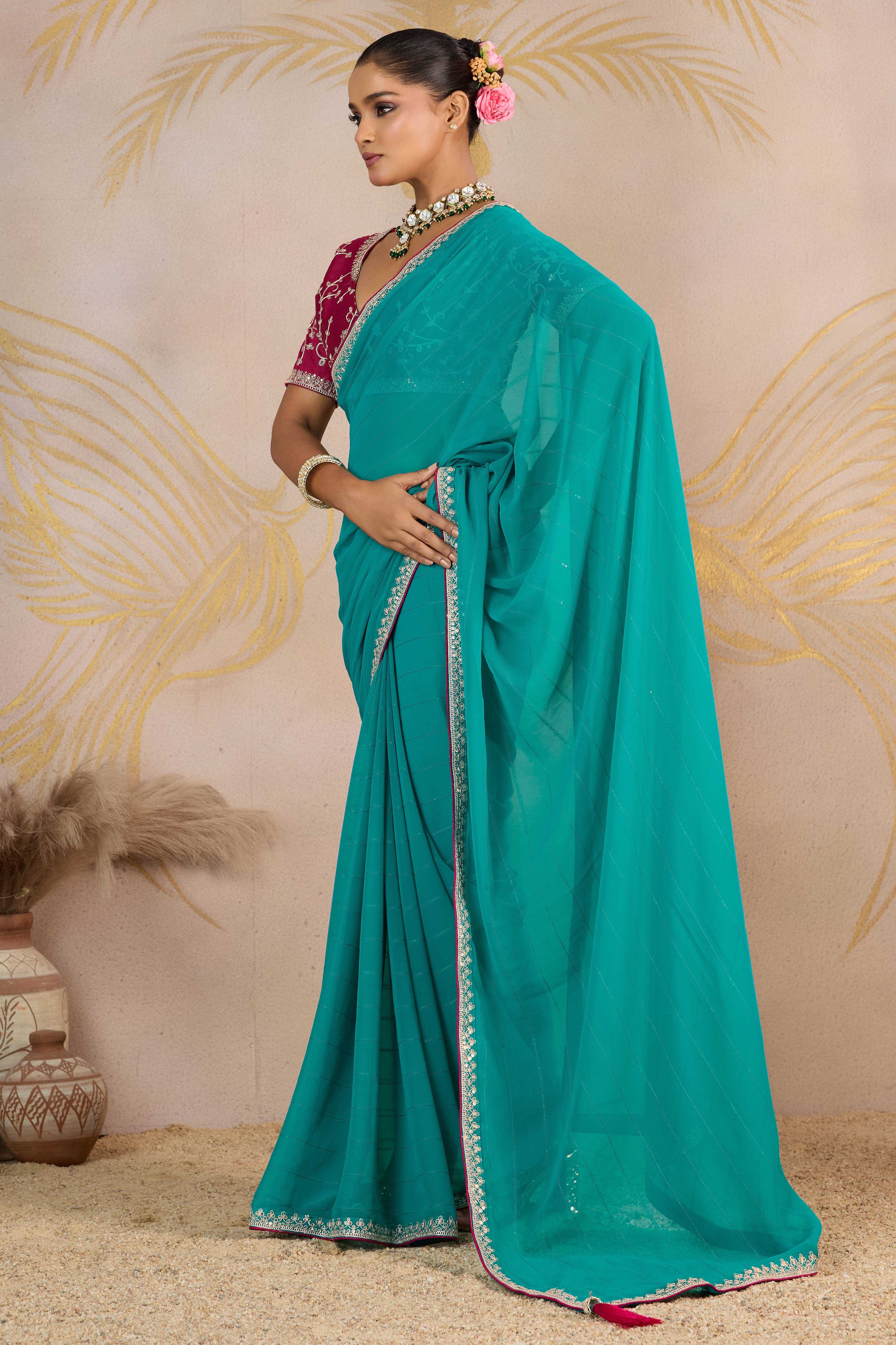 Sky Blue Zari Embroidered Georgette Saree Accented With Sequins