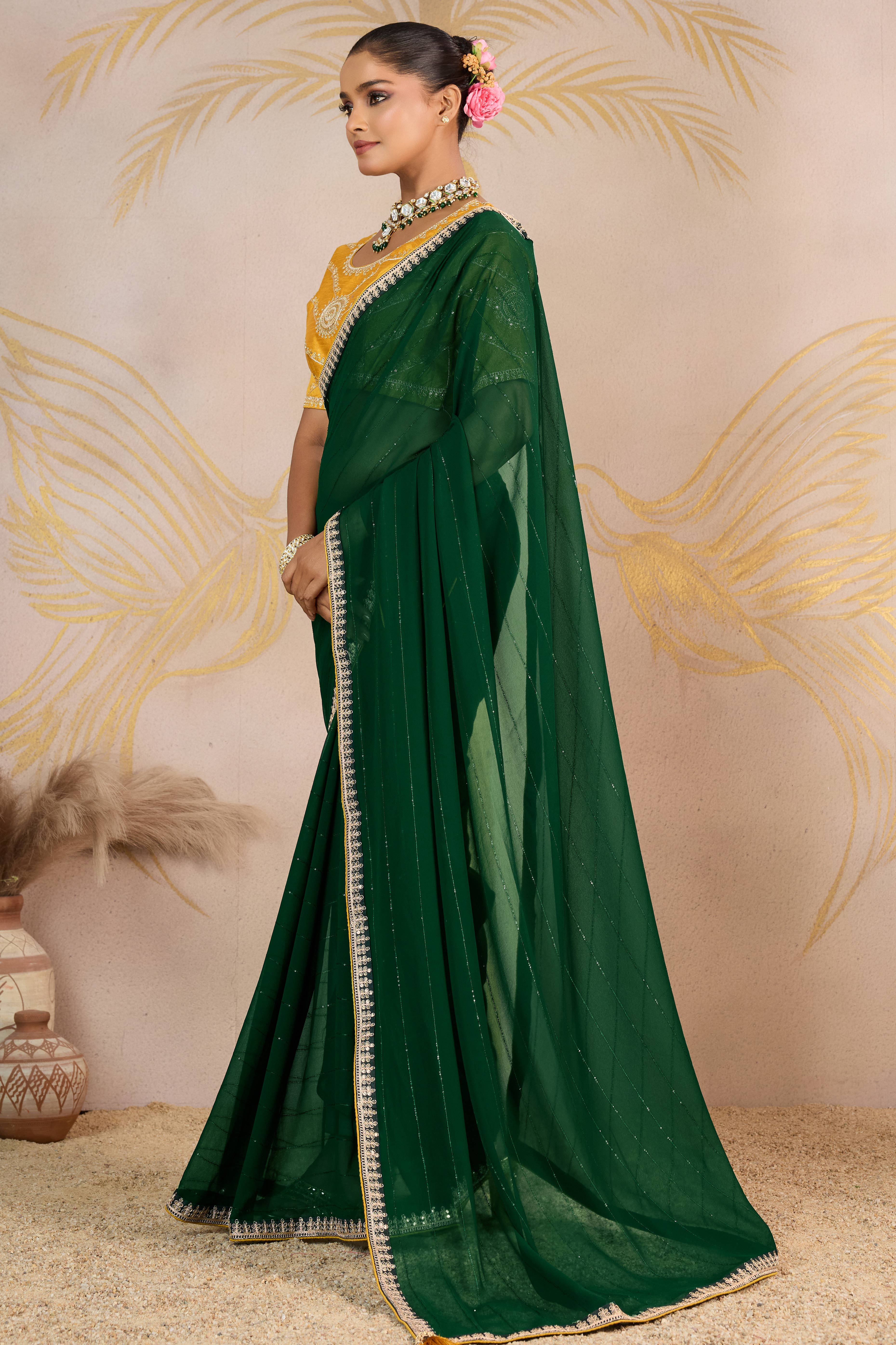 Green Zari Embroidered Georgette Saree Accented With Sequins