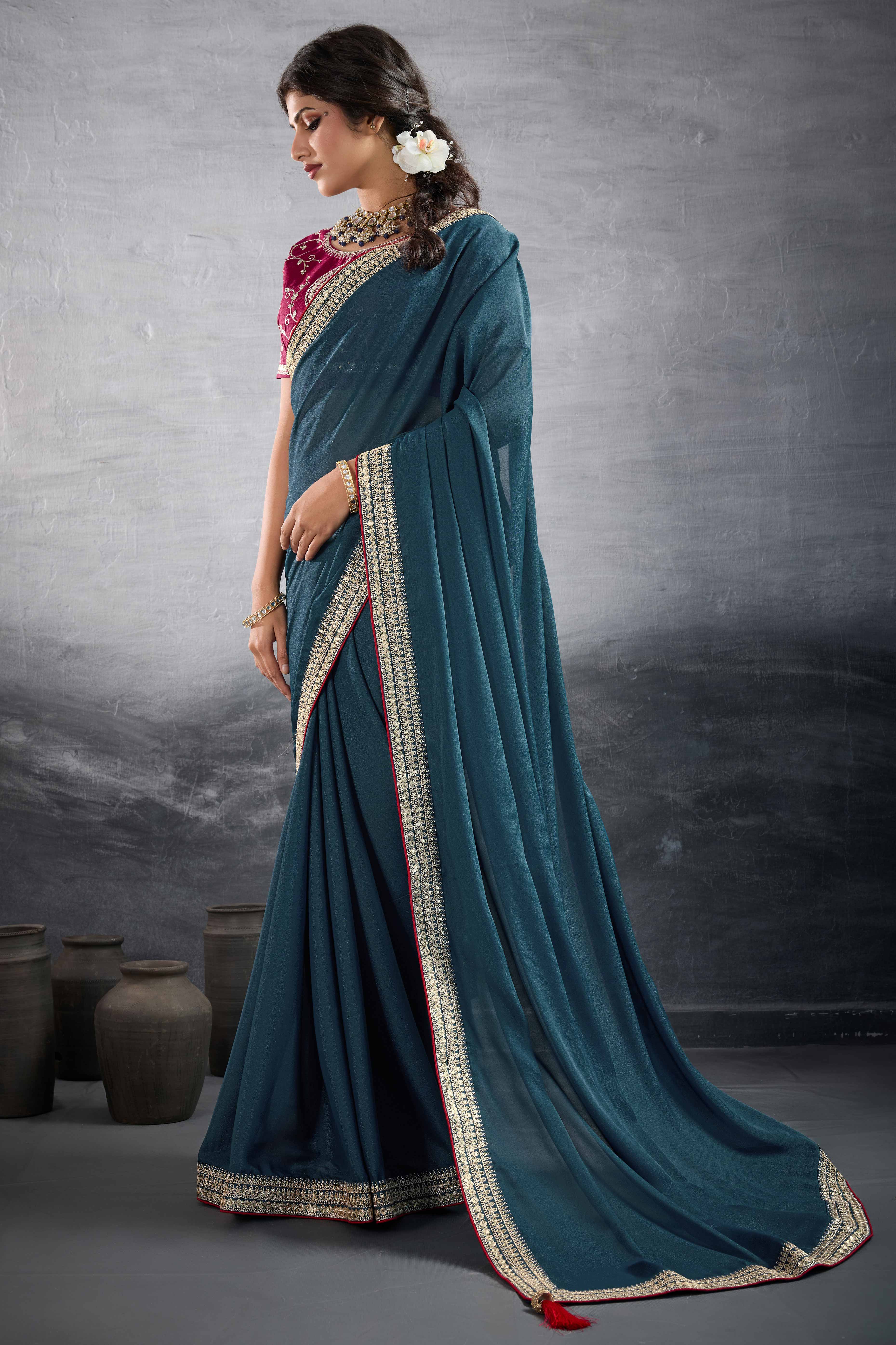 Teal Solid Saree In Georgette With Zari & Sequins Embroidery Border