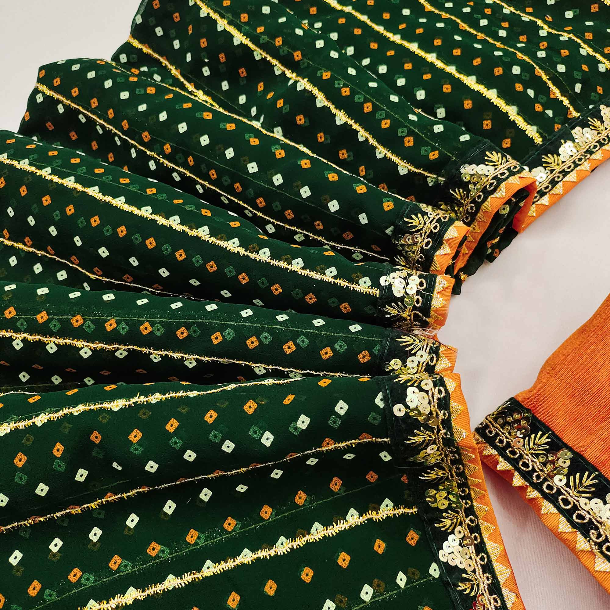 Charming Green Bandhani Printed Georgette Saree With Glittering Sequins & Zari Border