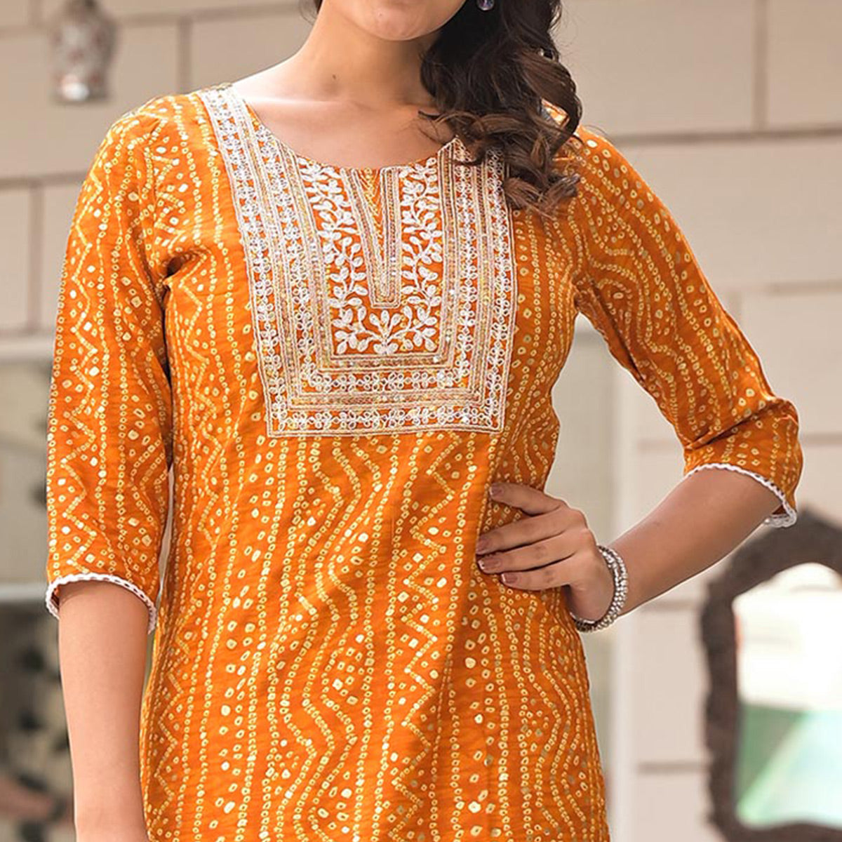 Mustard Foil Bandhani Printed With Embroidered Rayon Kurti