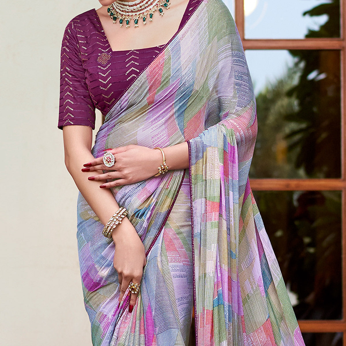 Purple Printed Chiffon Saree With Tassels