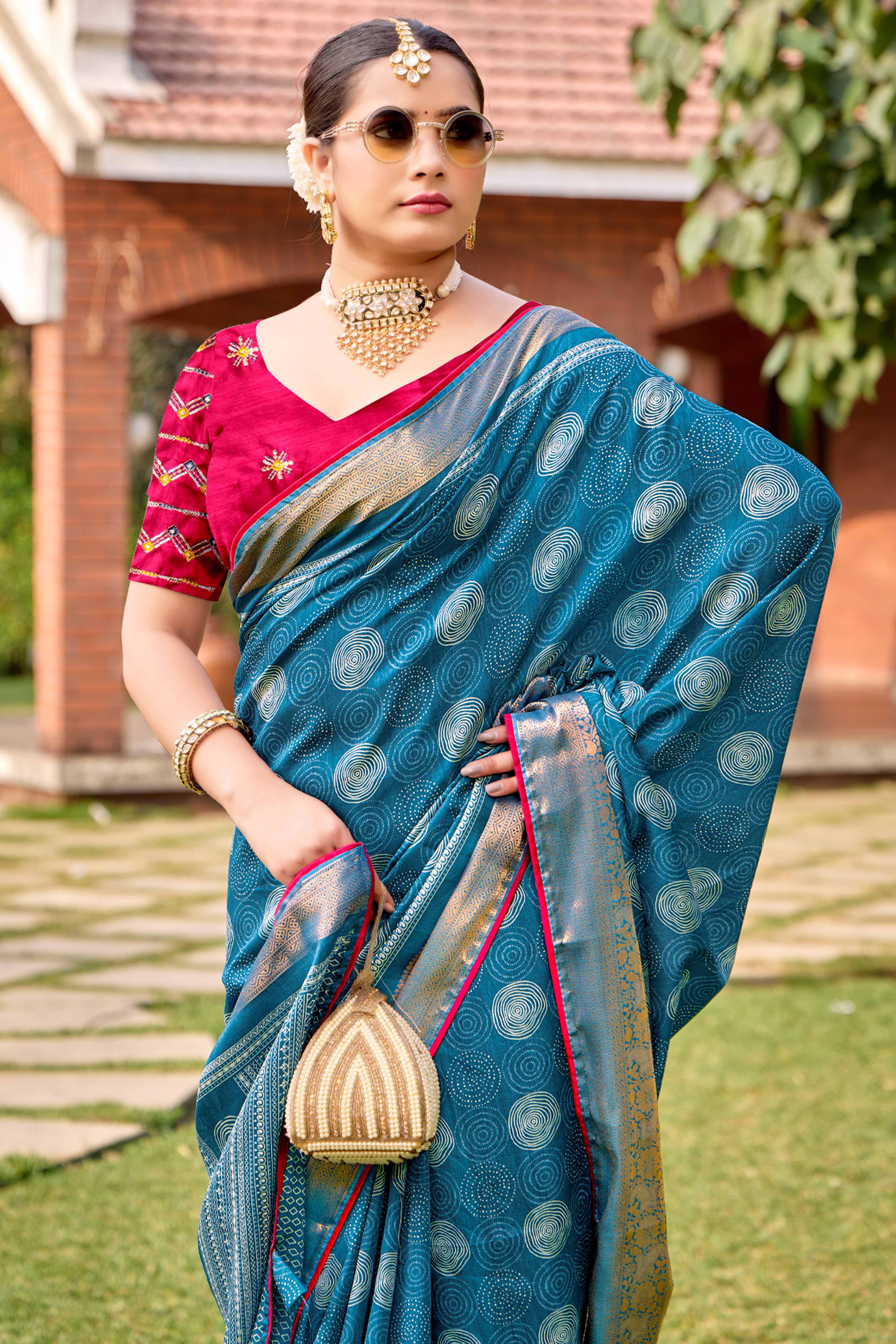 Blue Printed Dola Silk Saree With Ornate Zari Border & Tassel Pallu
