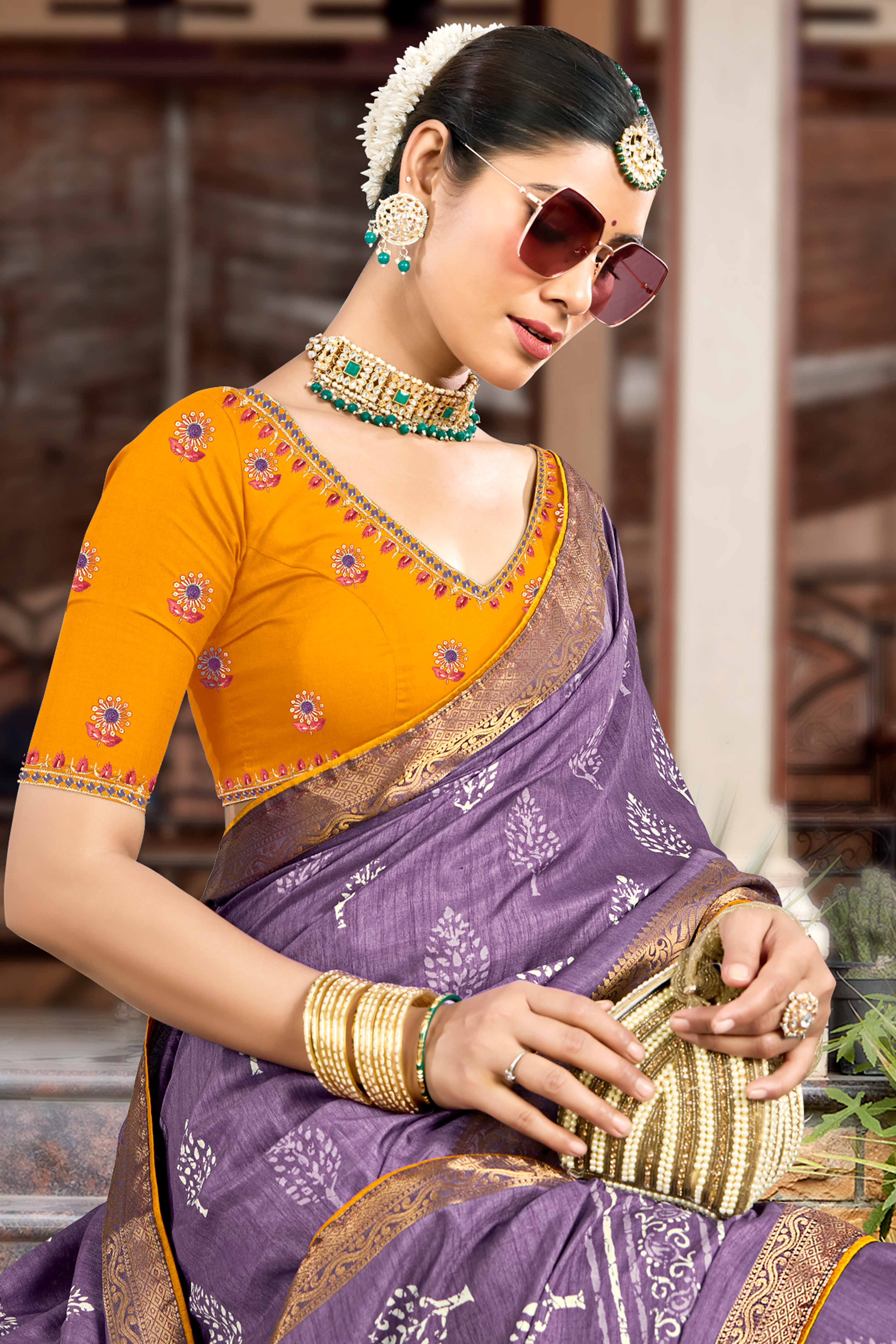 Purple Dola Silk Saree Featuring Artistic Print Work & Graceful Tassel Edging