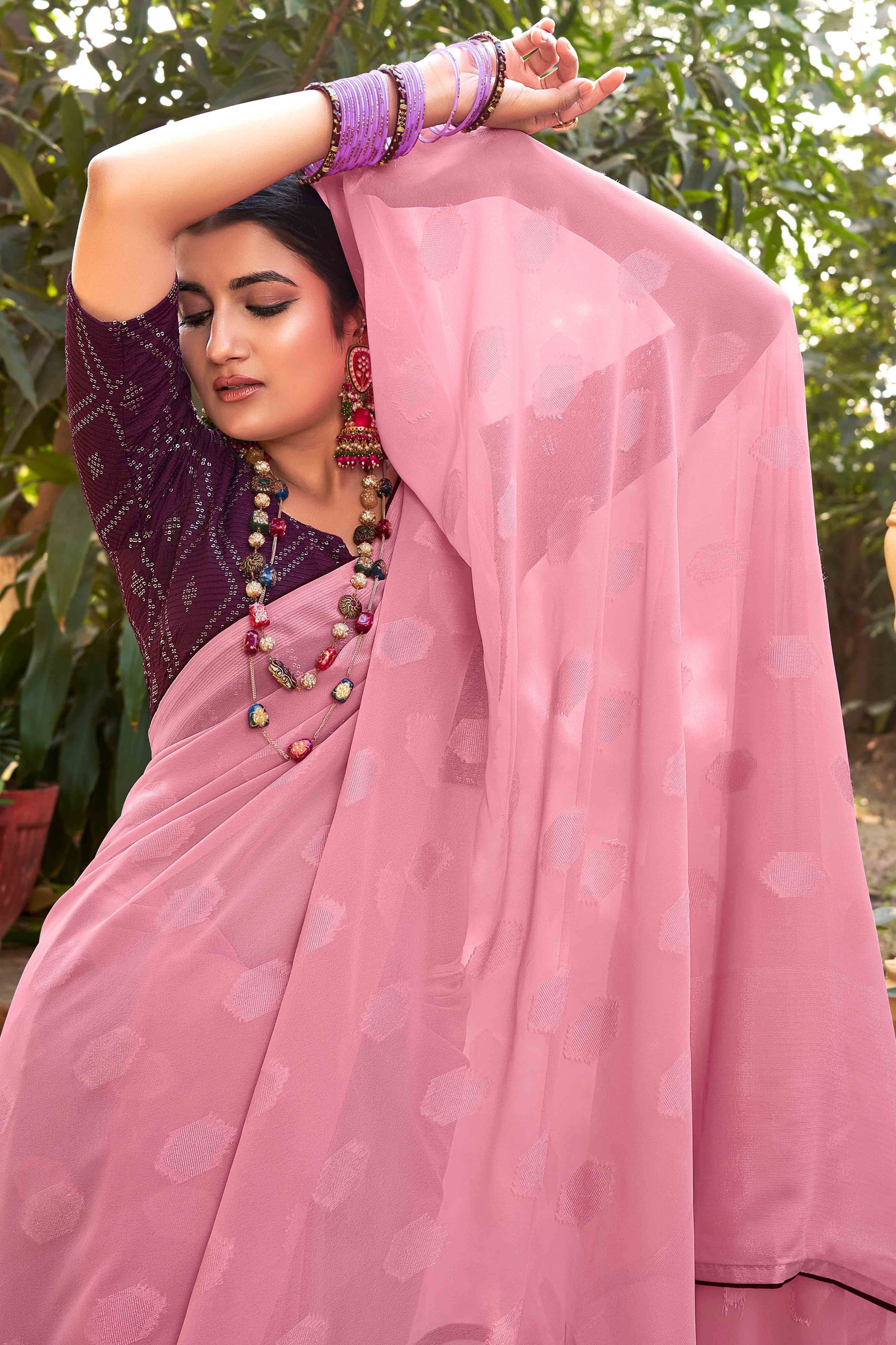 Onion Pink Woven Georgette Saree With Tassels