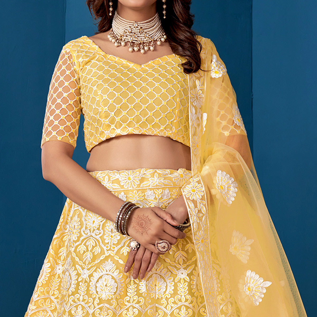 Yellow Floral Sequins Embroidered Net Lehenga Choli