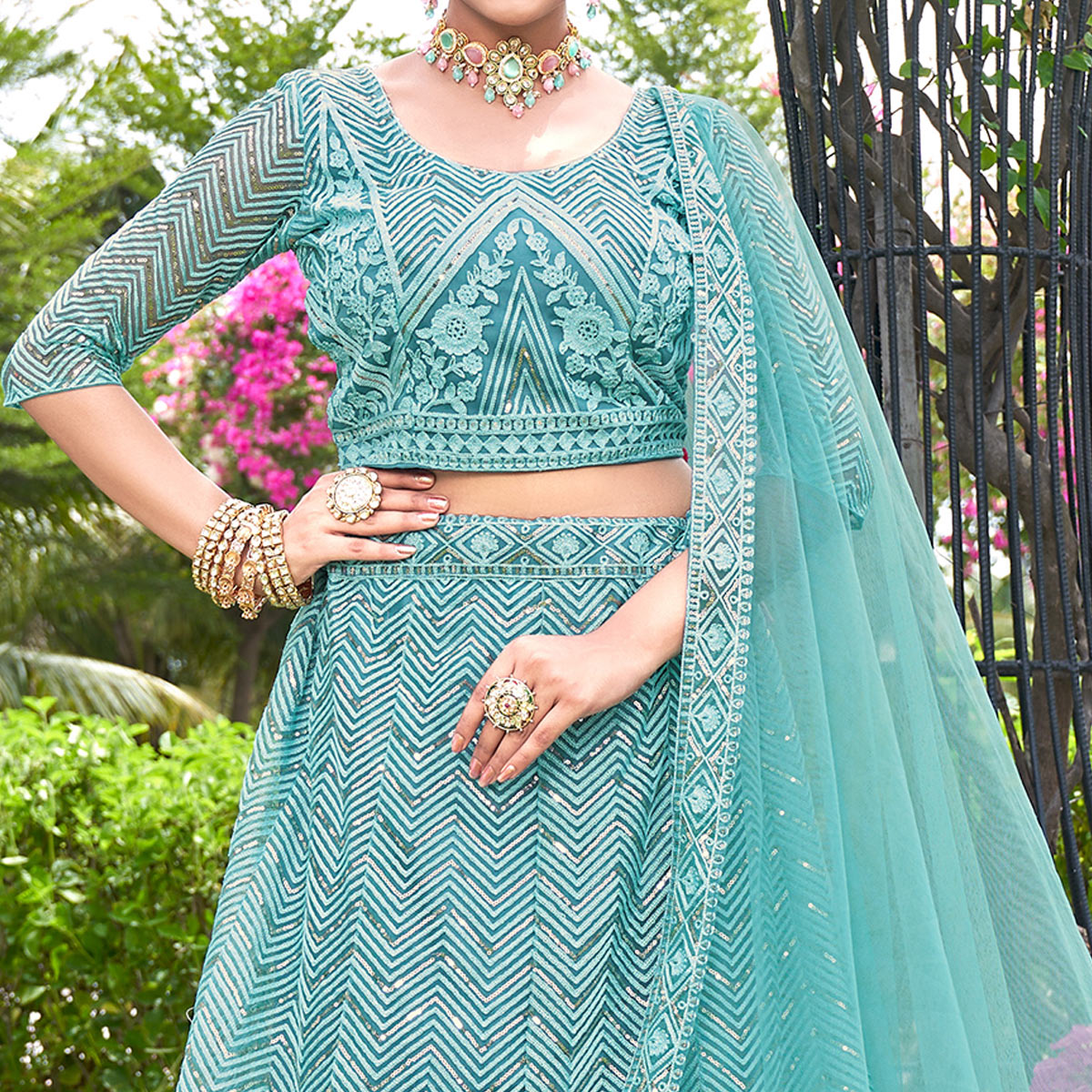 Blue Sequins Floral Embroidered Net Semi Stitched Lehenga Choli