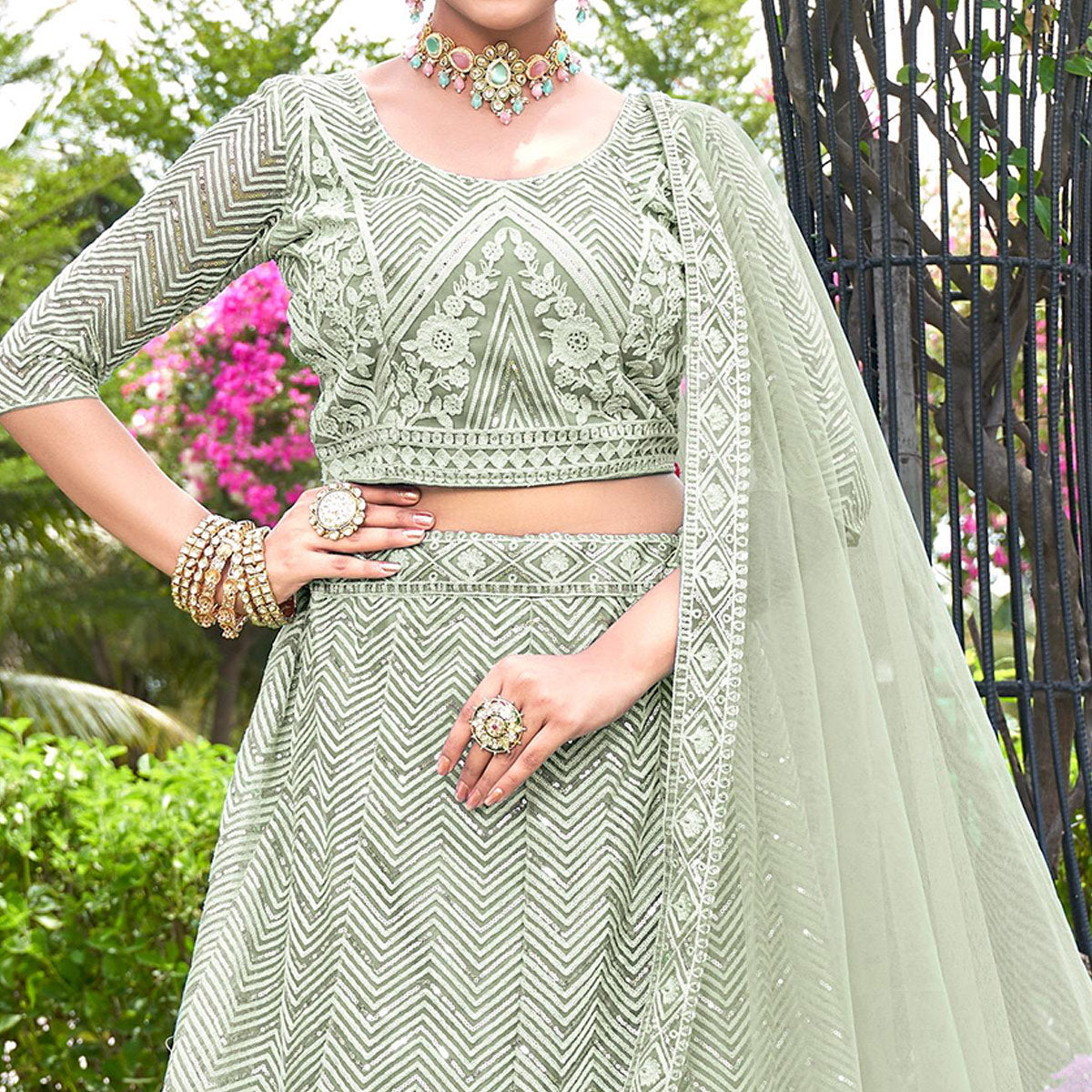 Green Sequins Floral Embroidered Net Semi Stitched Lehenga Choli