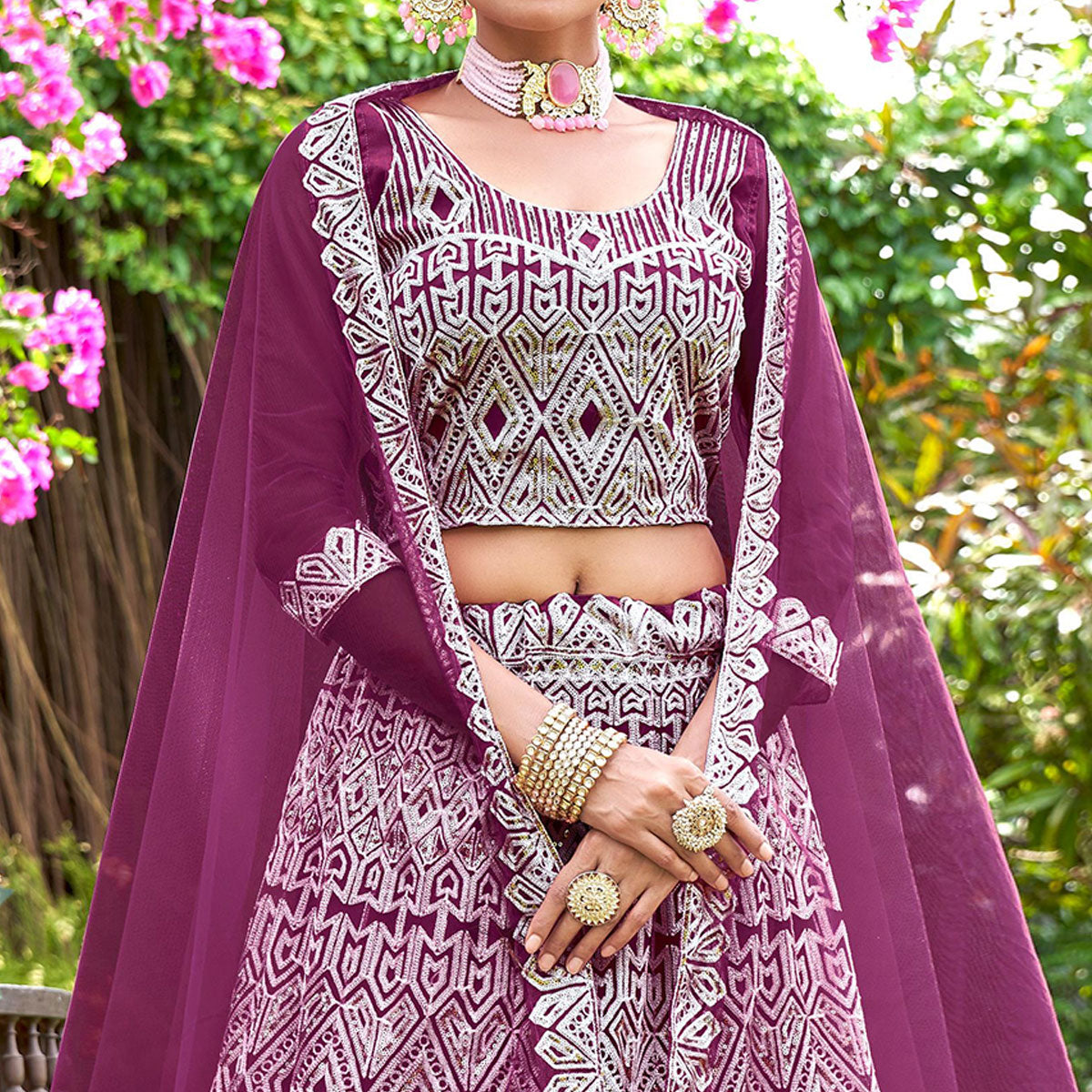 Wine Sequins Embroidered Net Semi Stitched Lehenga Choli