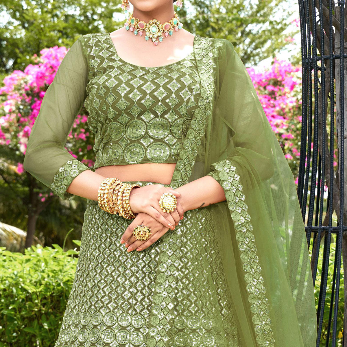 Green Sequins Embroidered Net Lehenga Choli