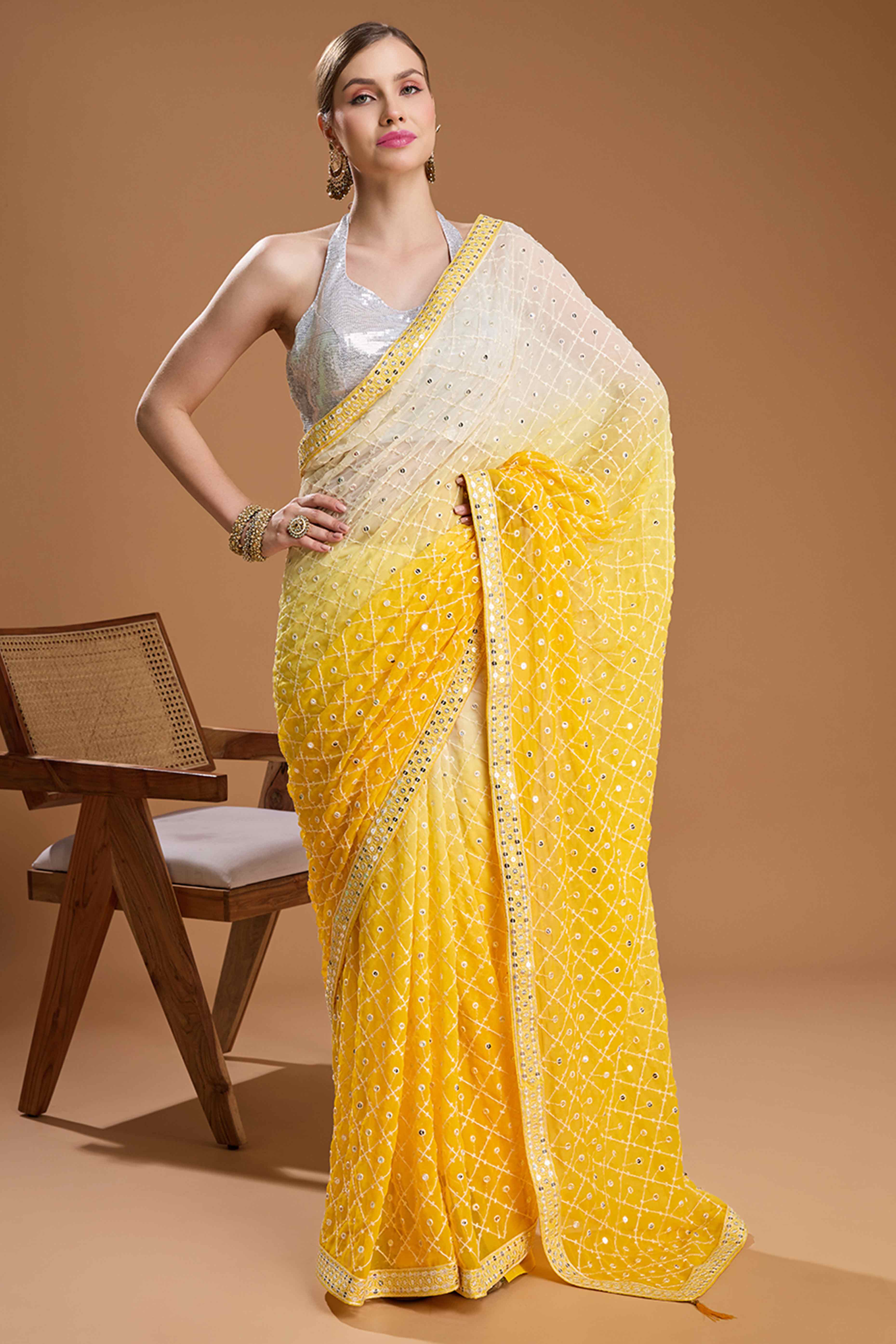 Yellow Georgette Saree Enhanced with Elegant Sequins Embellishments
