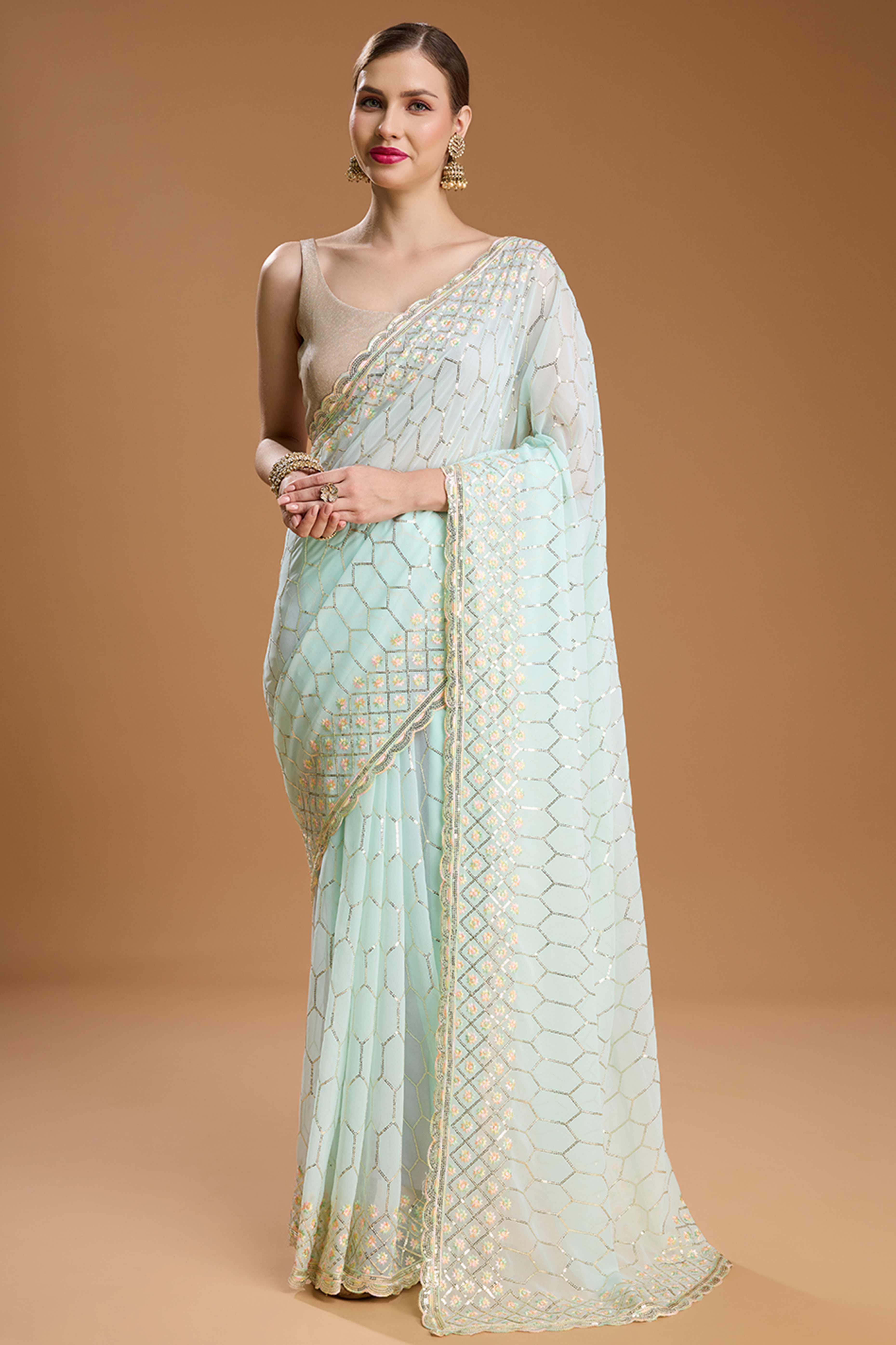 Mint Green Georgette Saree Enhanced with Elegant Sequins Embellishments