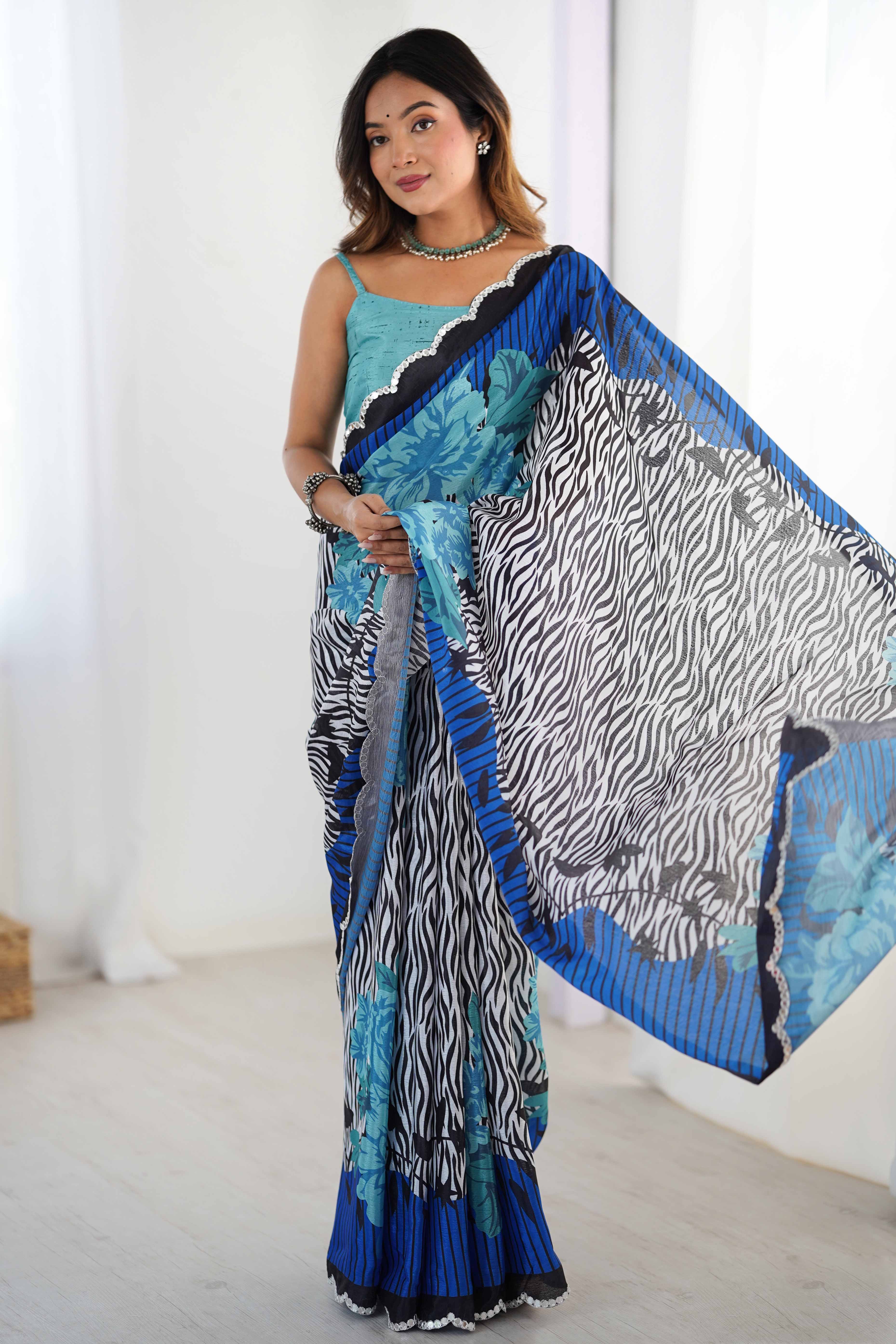 Blue Chinon Saree with Glimmering Mirror Work and Floral Prints