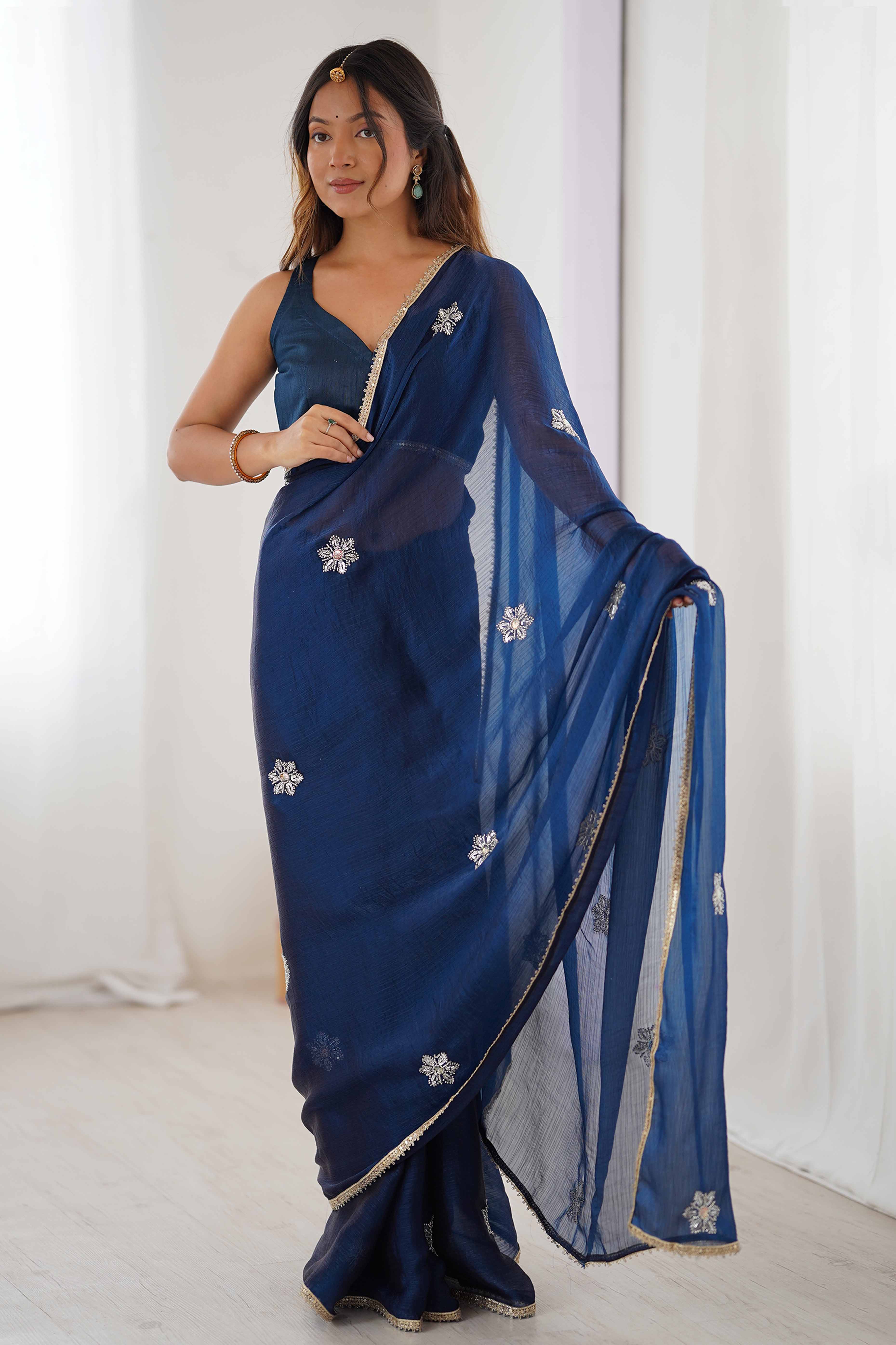 Blue Organza Saree Embellished with Intricate Floral Work and Elegant Lace Detailing