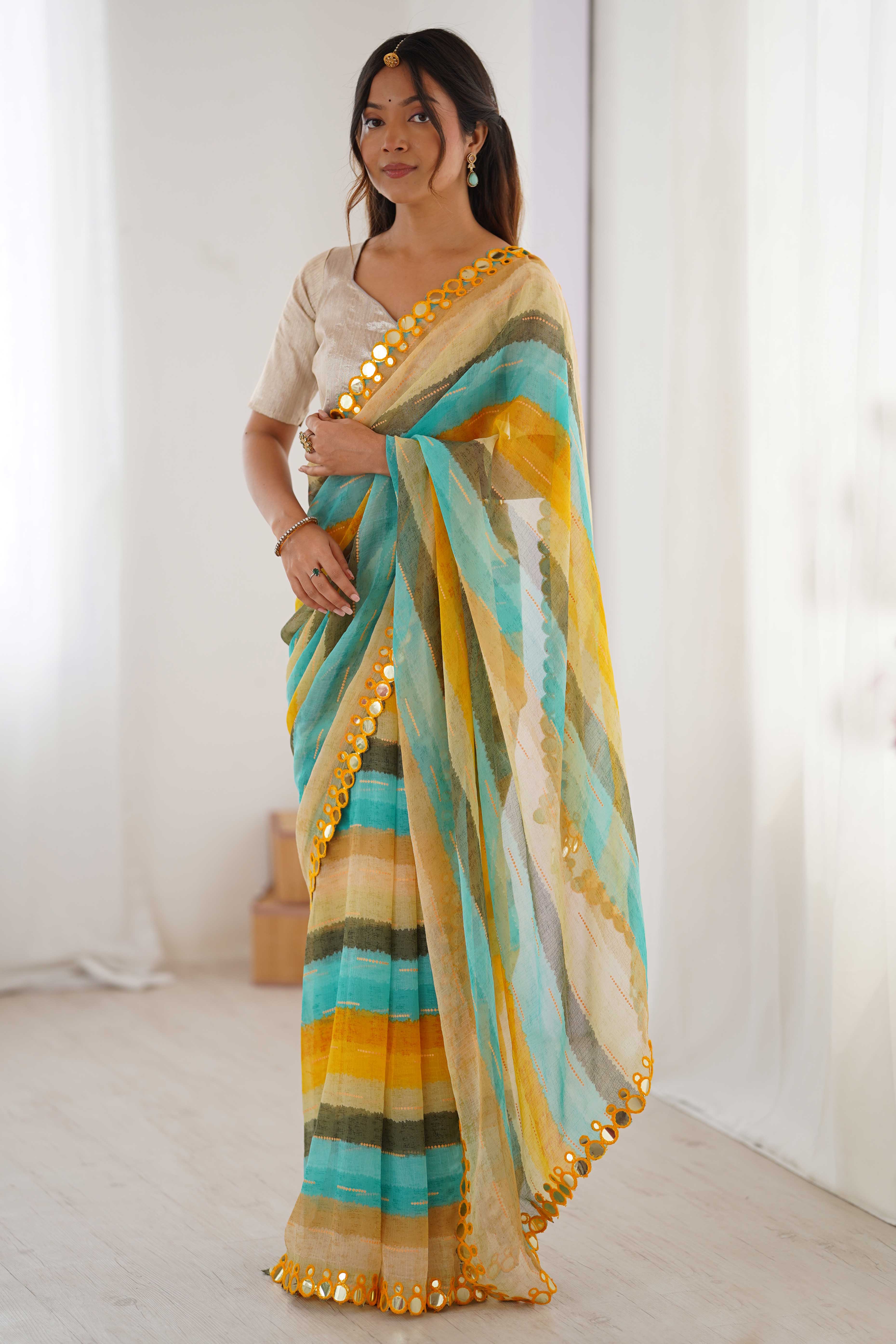 Soft Chiffon Yellow Saree Featuring Classic Leheriya and Mirror Work Edges