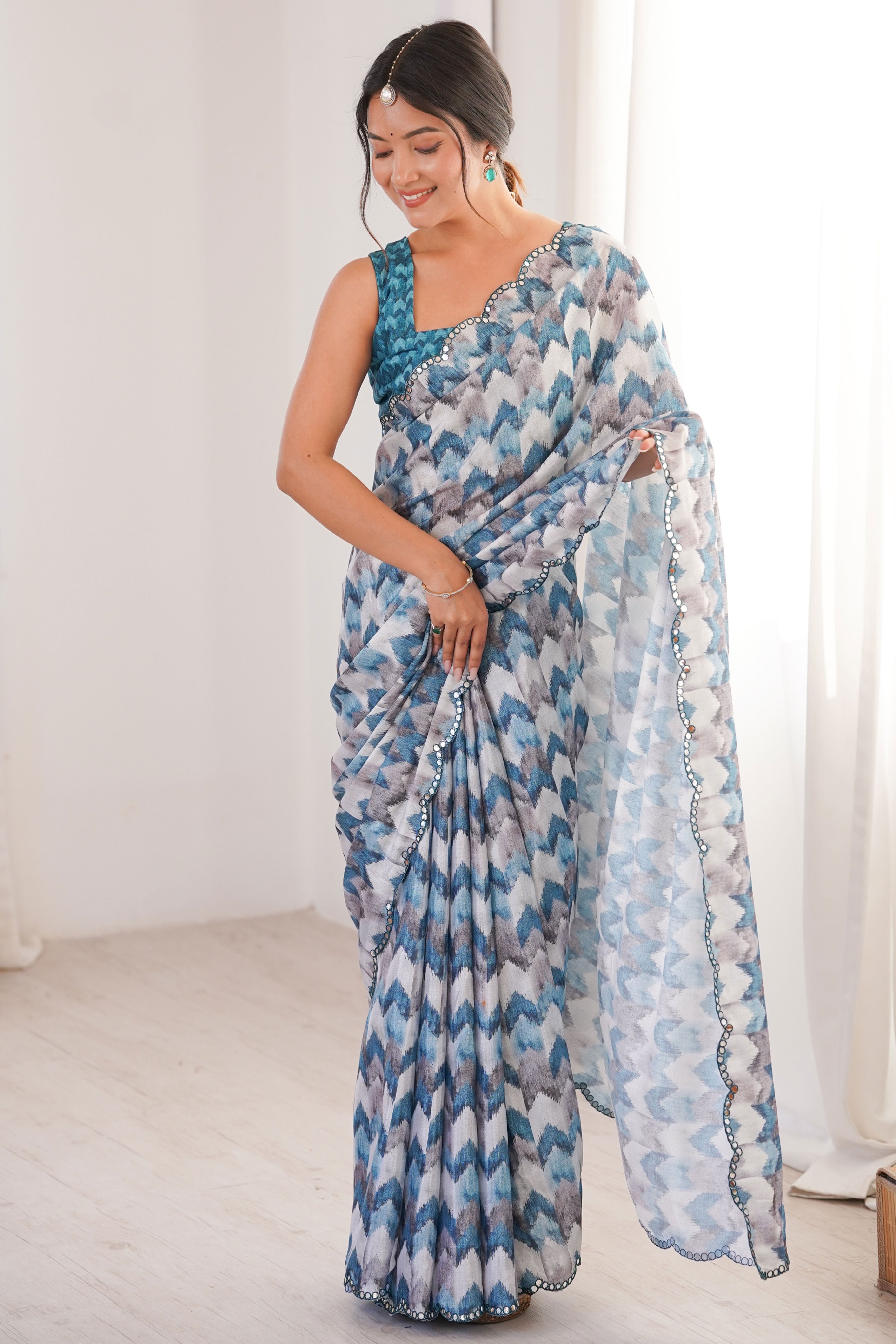 Elegant White Floral Digital Printed Chinon Saree Accented With Intricate Embroidered Border