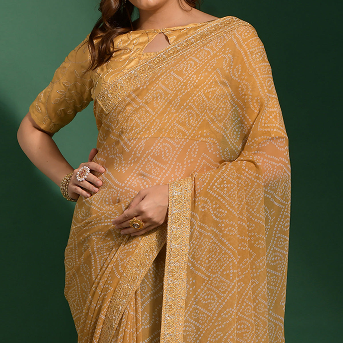 Beige Bandhani Printed Georgette Saree With Embroidered Border