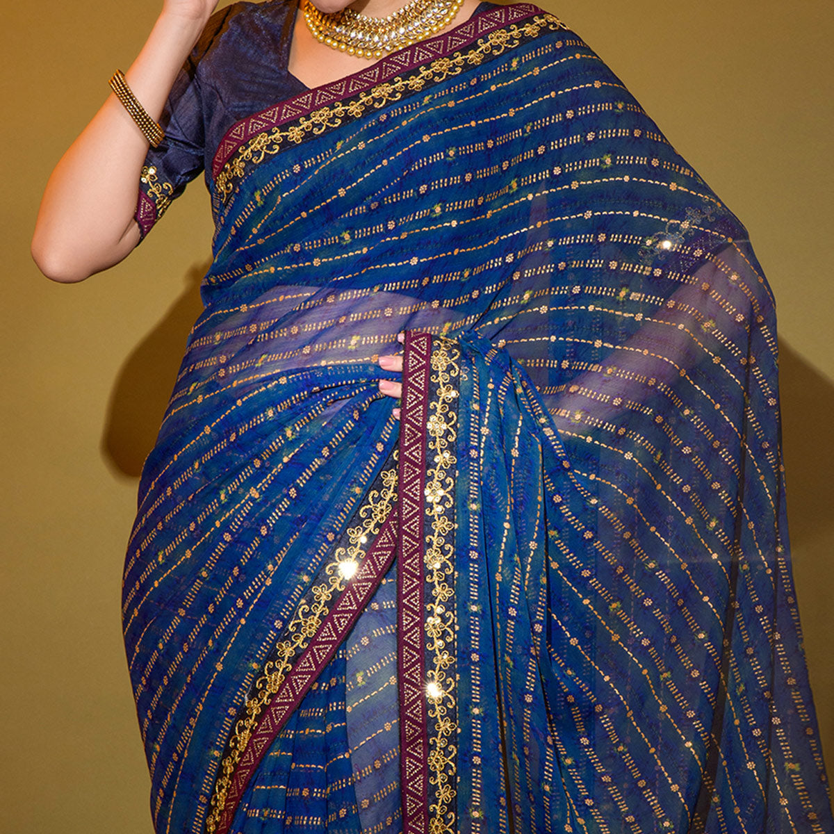 Blue Foil Printed Georgette Saree With Embroidered Border