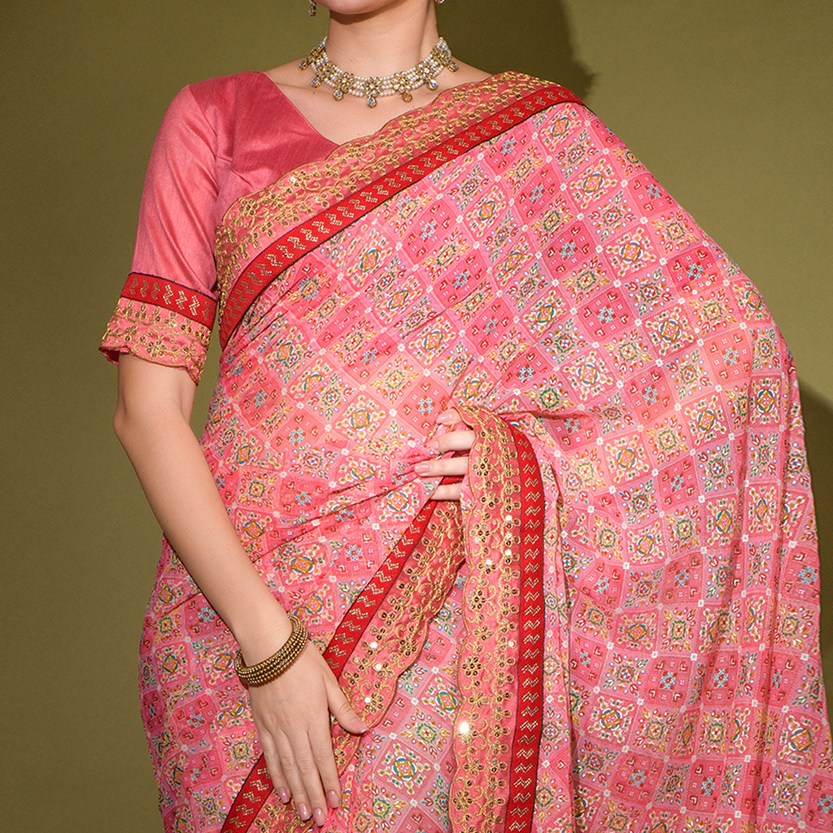 Pink Patola Foil Printed Georgette Saree with Embroidered Border