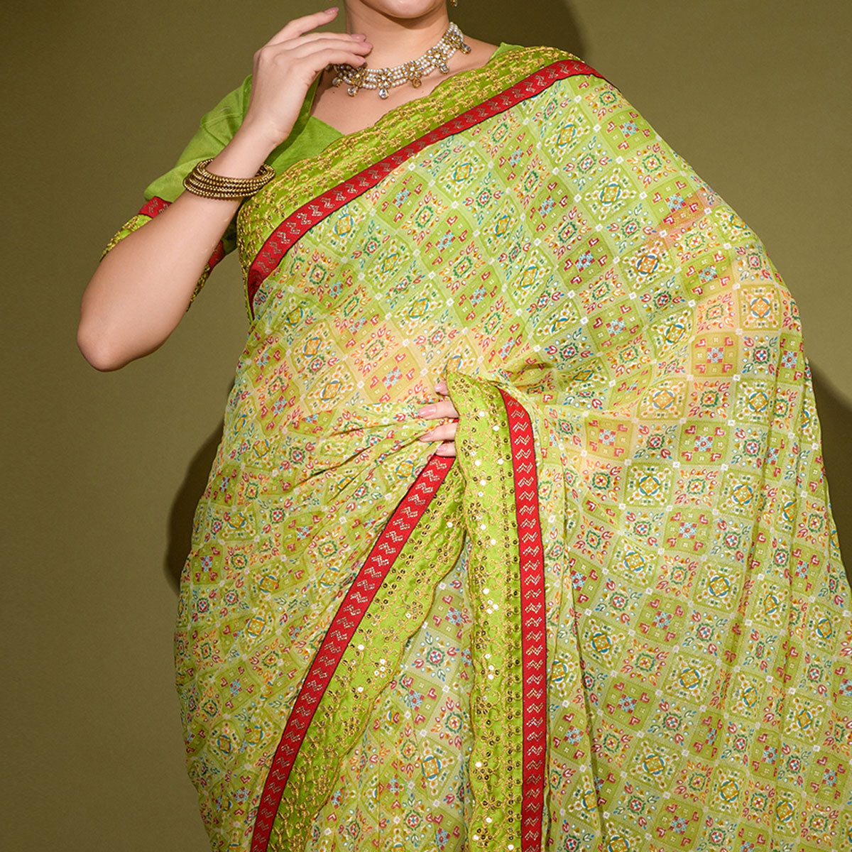 Green Patola Foil Printed Georgette Saree with Embroidered Border