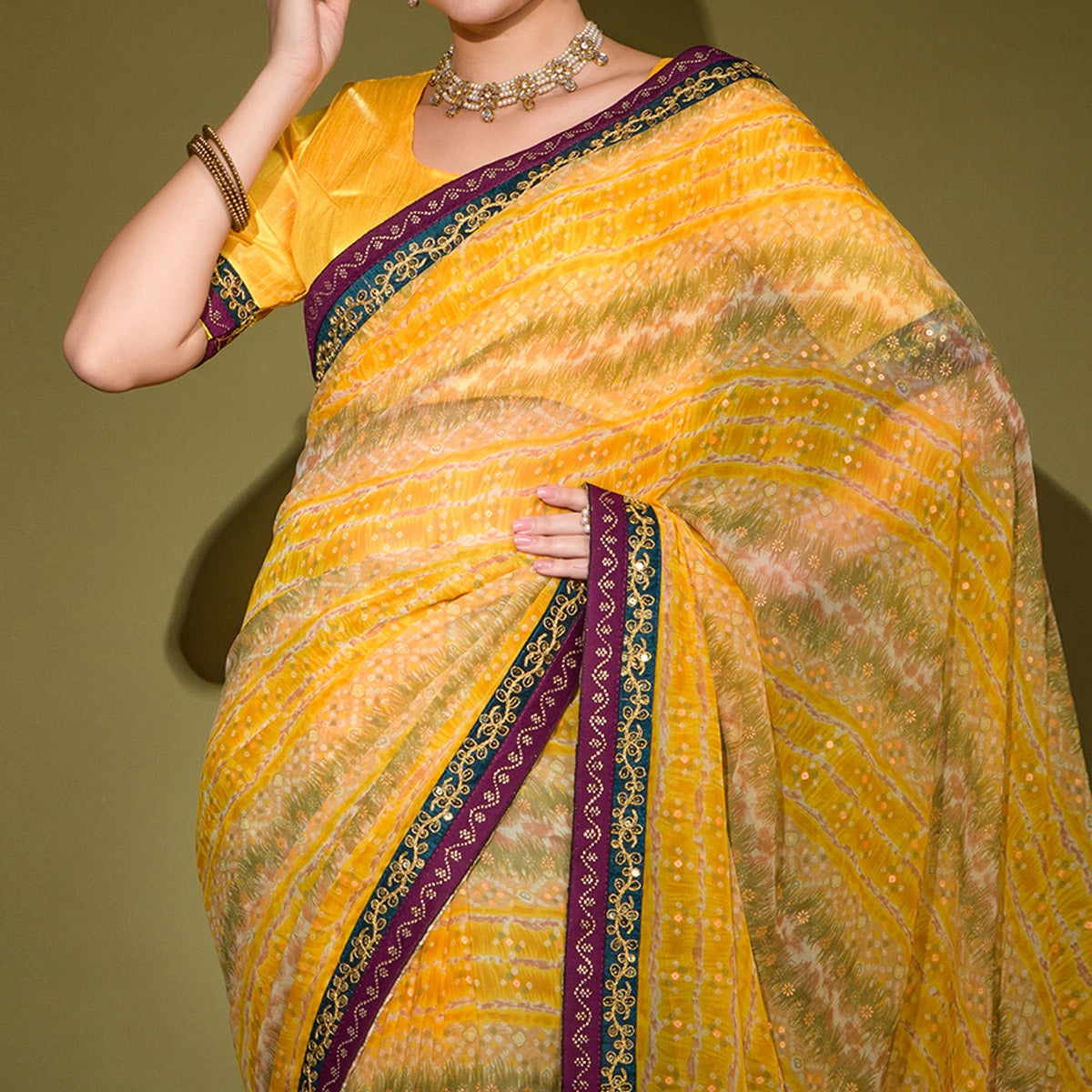 Yellow Leheriya Printed Georgette Saree With Embroidered Border