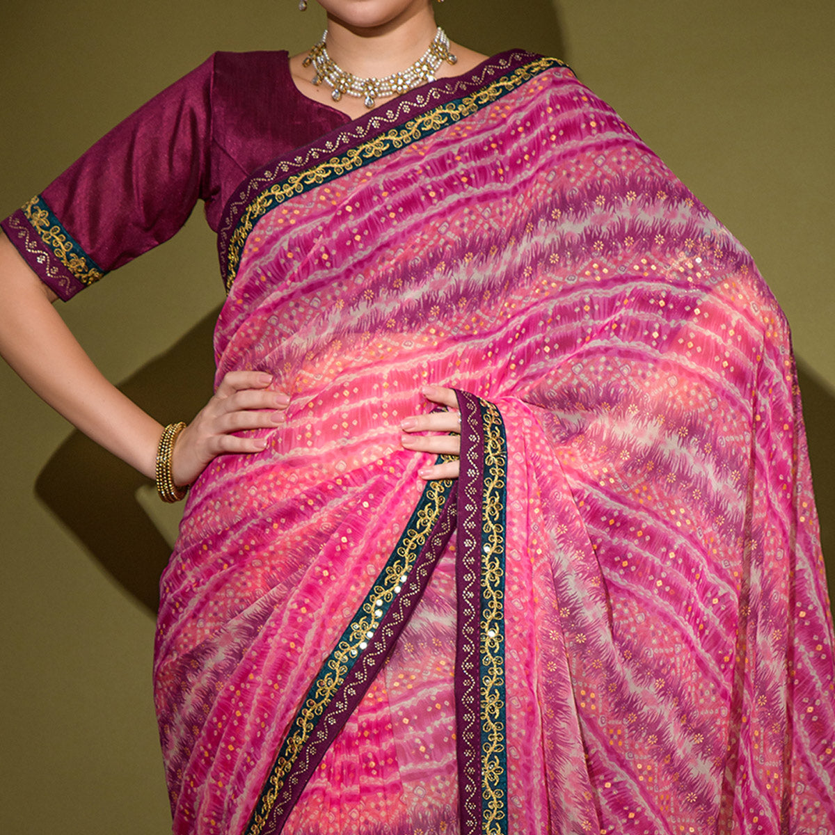 Pink Leheriya Printed Georgette Saree With Embroidered Border