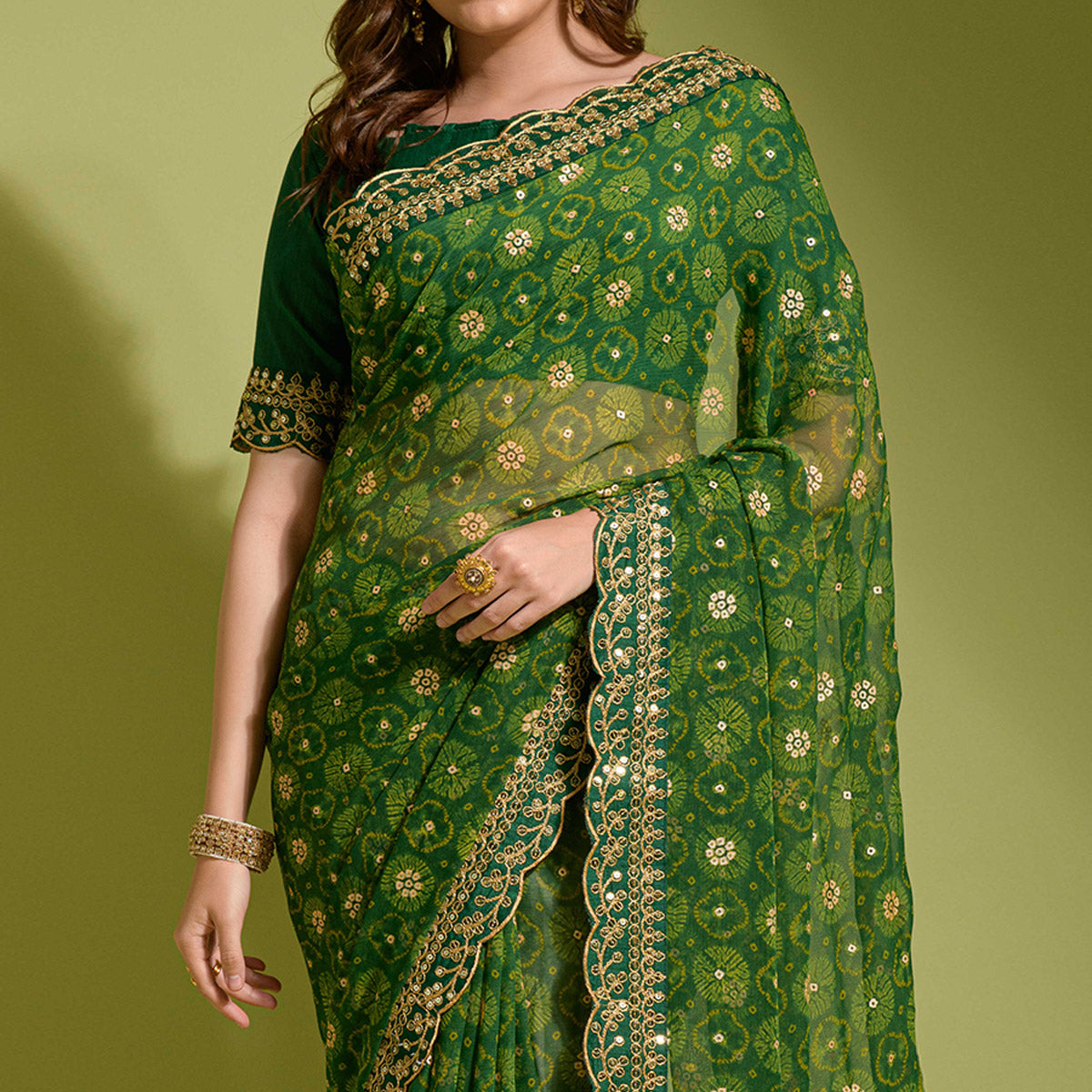 Green Bandhani Foil Printed Georgette Saree With Embroidered Border