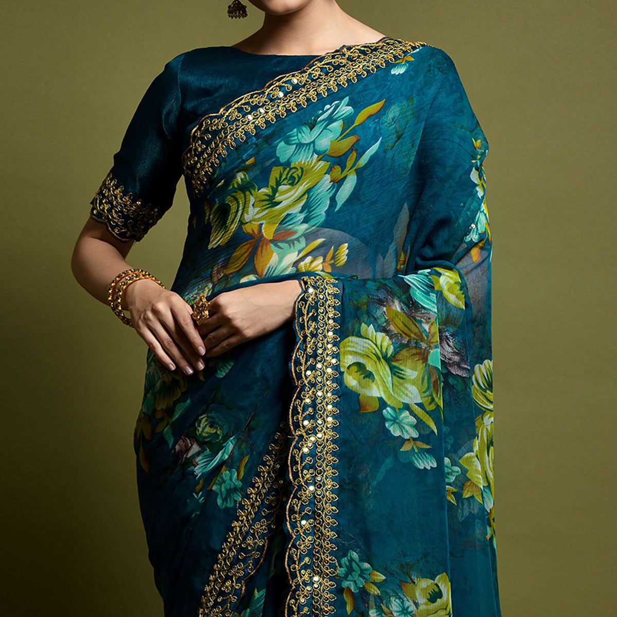 Teal Floral Printed Georgette Saree With Embroidered Border