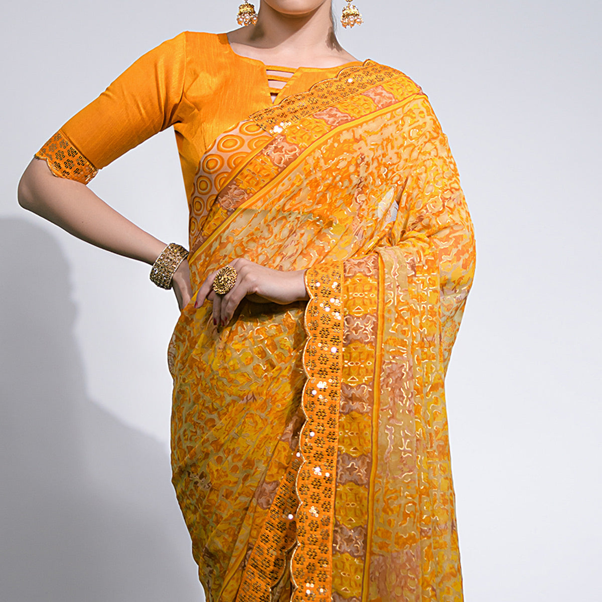 Yellow Foil Printed Chiffon Saree With Embroidered Border