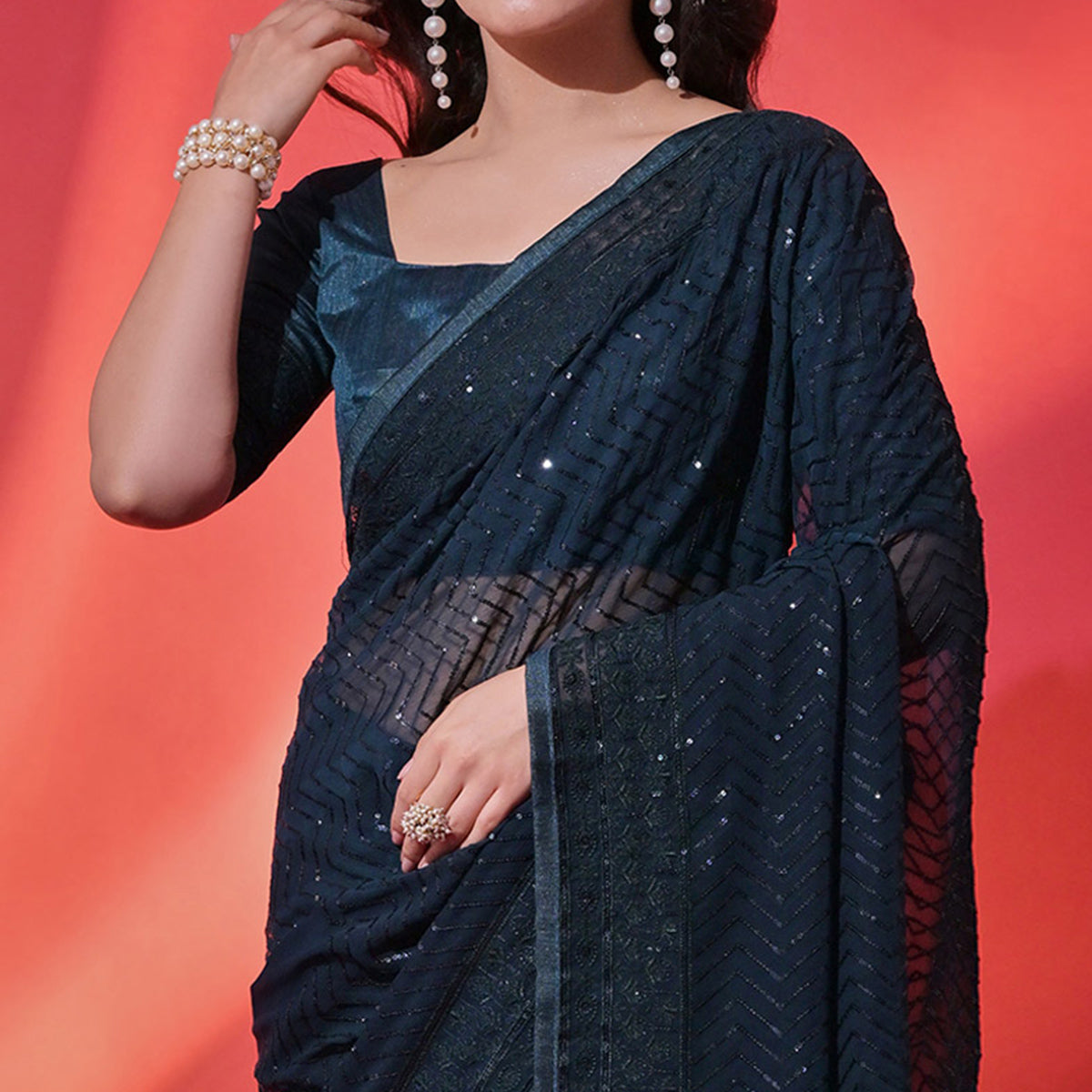 Teal Sequins Embroidered Georgette Saree