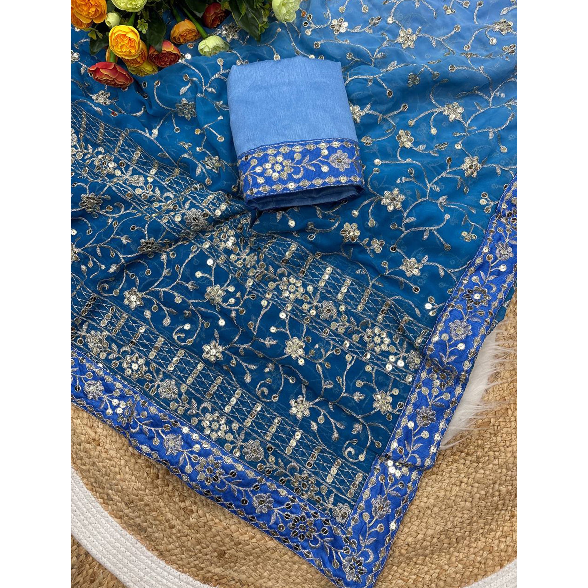 Beautiful Sky Blue Partywear Saree Crafted in Georgette with Sequins and Thread Work