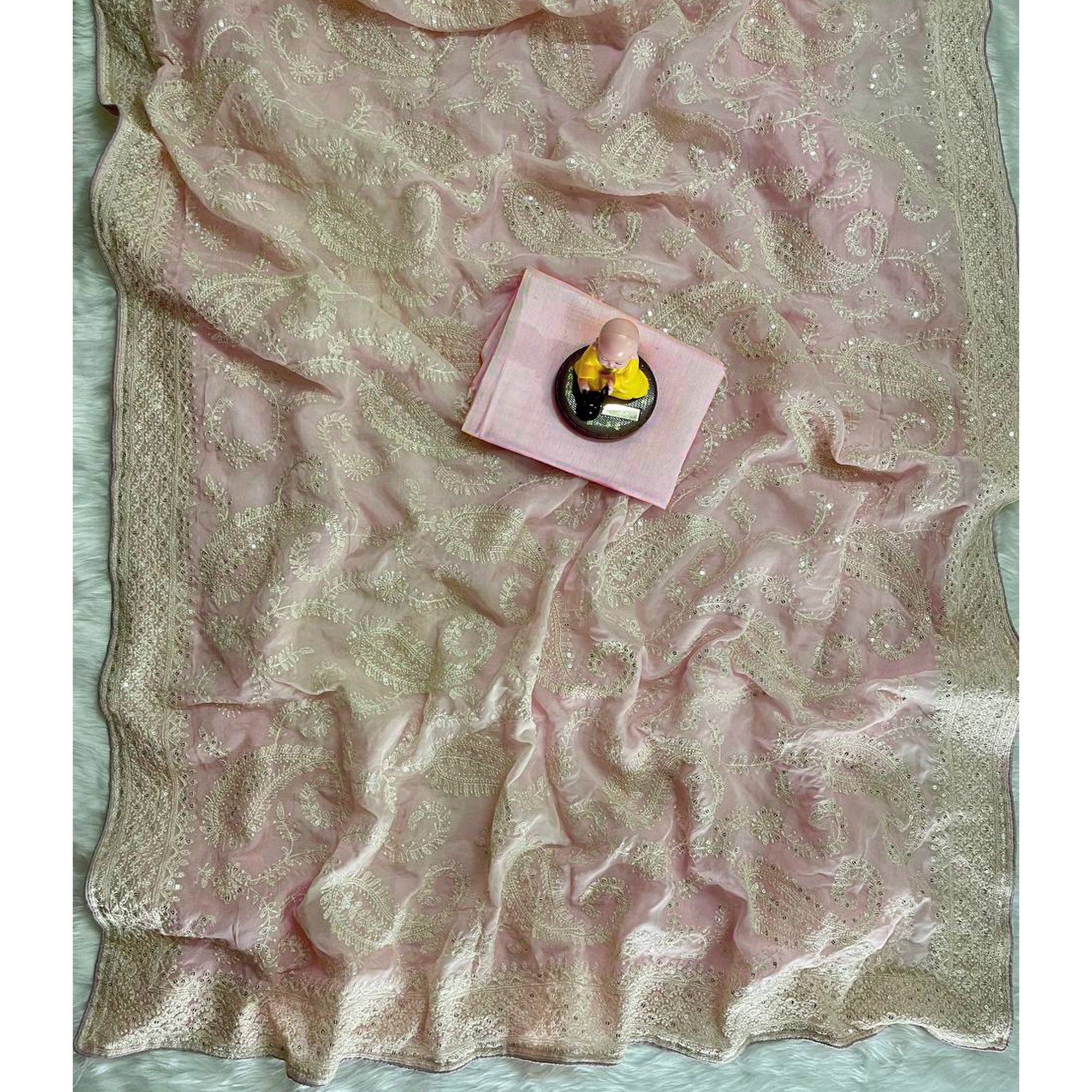 Lustrous Pink Organza Silk Saree Beautified With Paisley Embroidery & Glittering Sequins Work