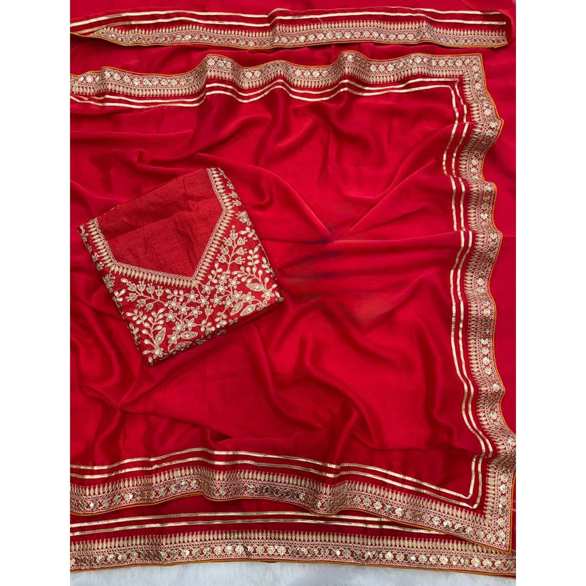 Red Festive Silk Blend Saree Highlighted with Silver Thread Work and Shimmering Sequins