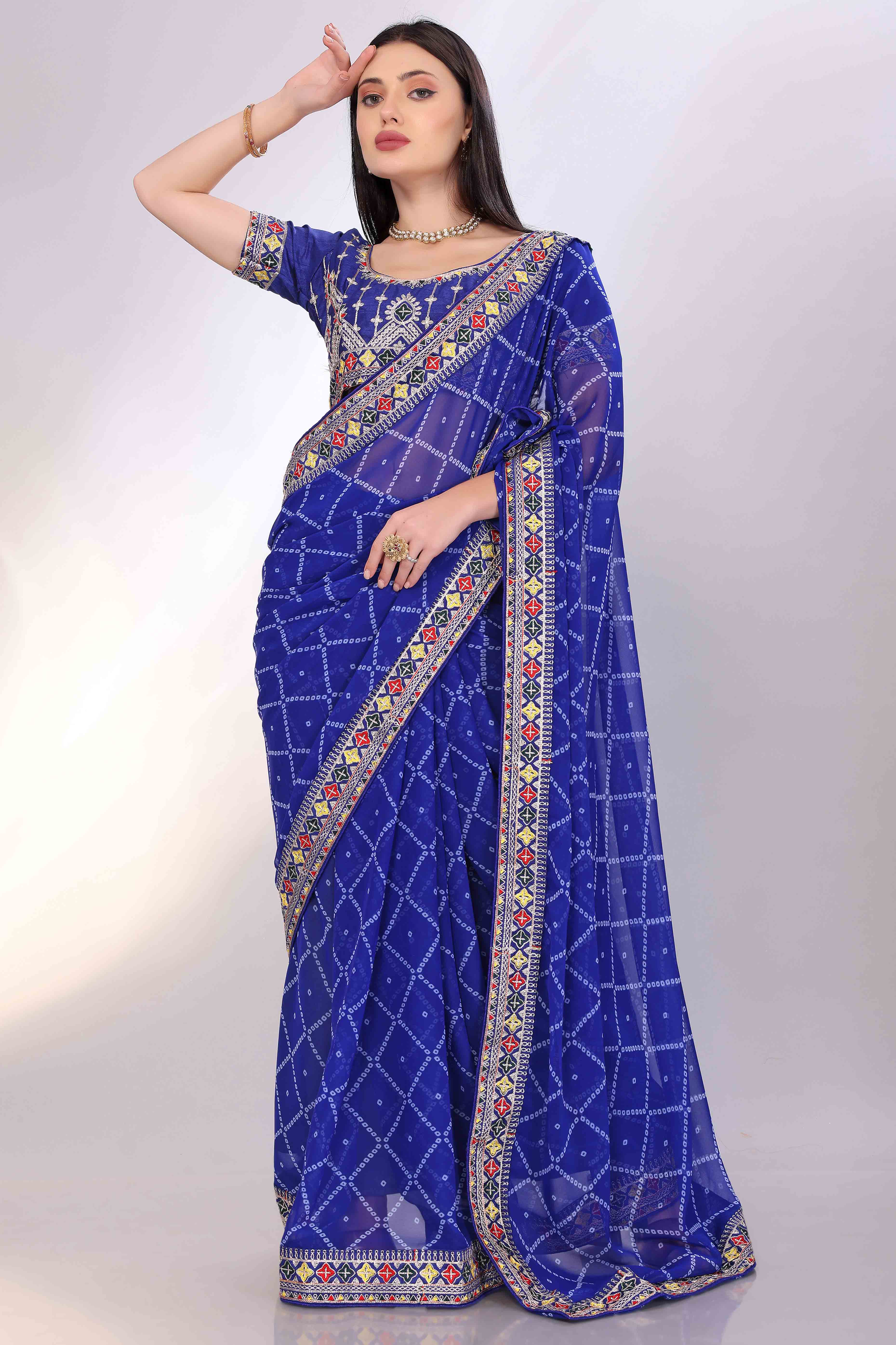Blue Bandhani Printed Georgette Saree Framed With Elegant Embroidered Border