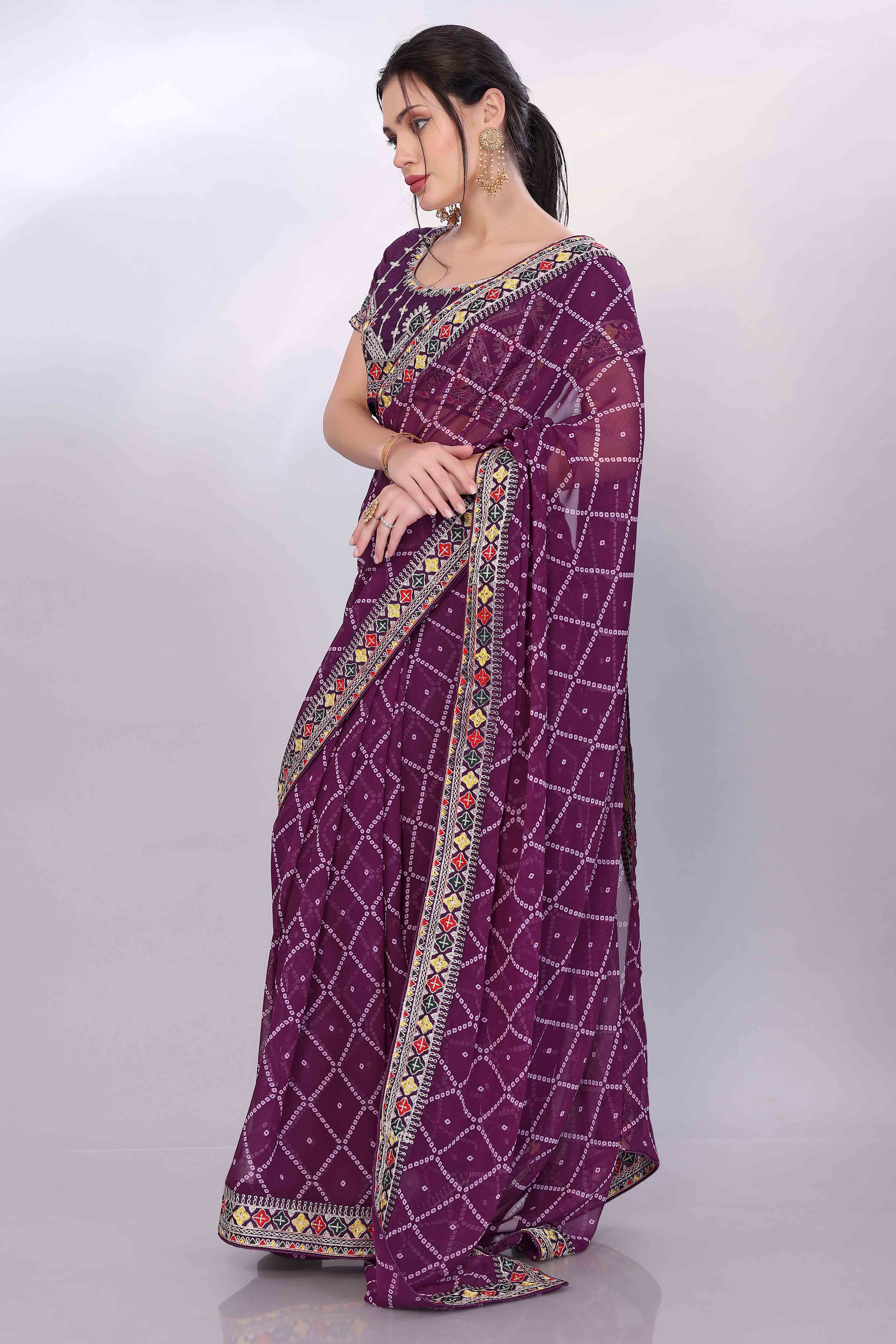 Wine Bandhani Printed Georgette Saree Framed With Elegant Embroidered Border
