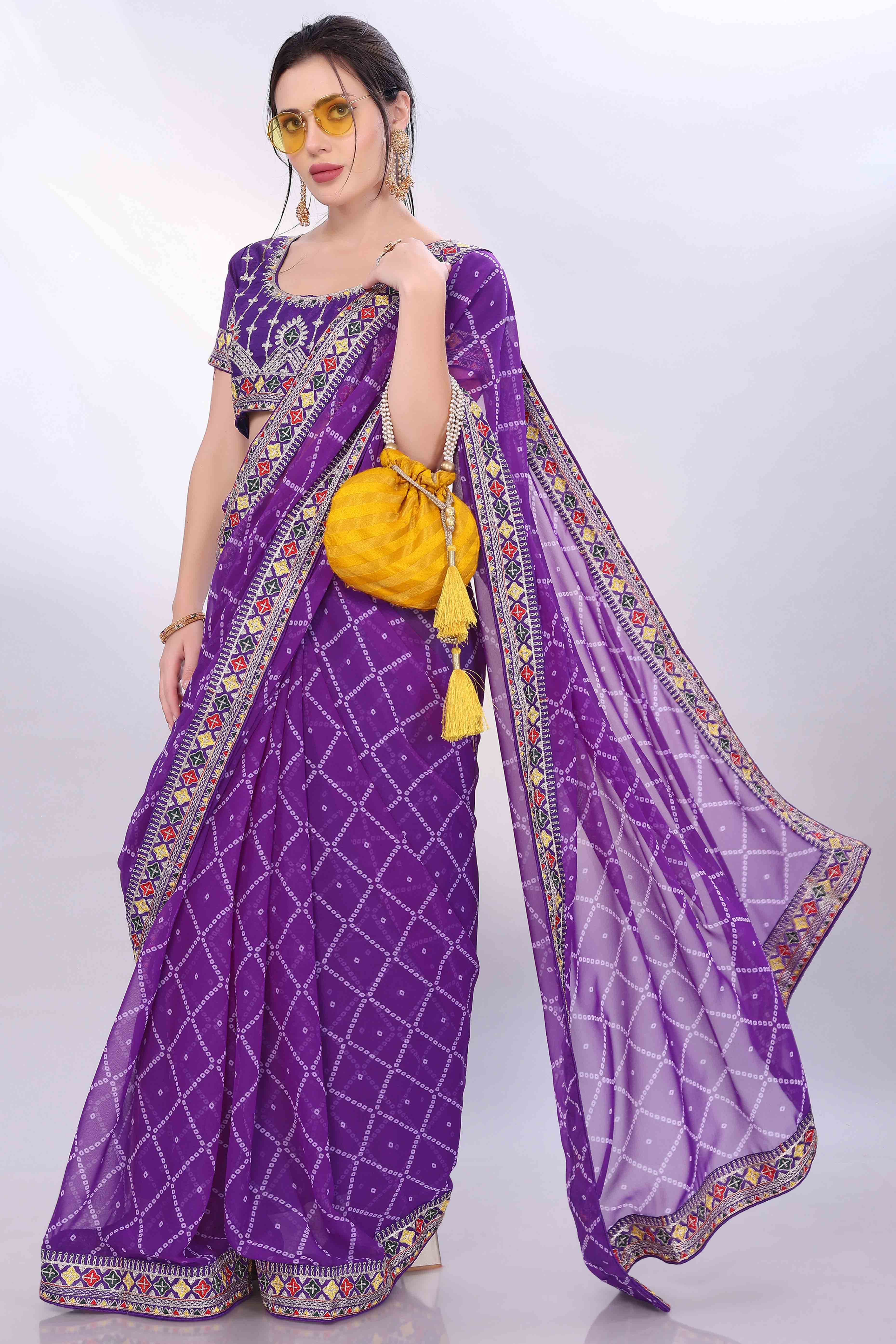 Purple Bandhani Printed Georgette Saree Framed With Elegant Embroidered Border