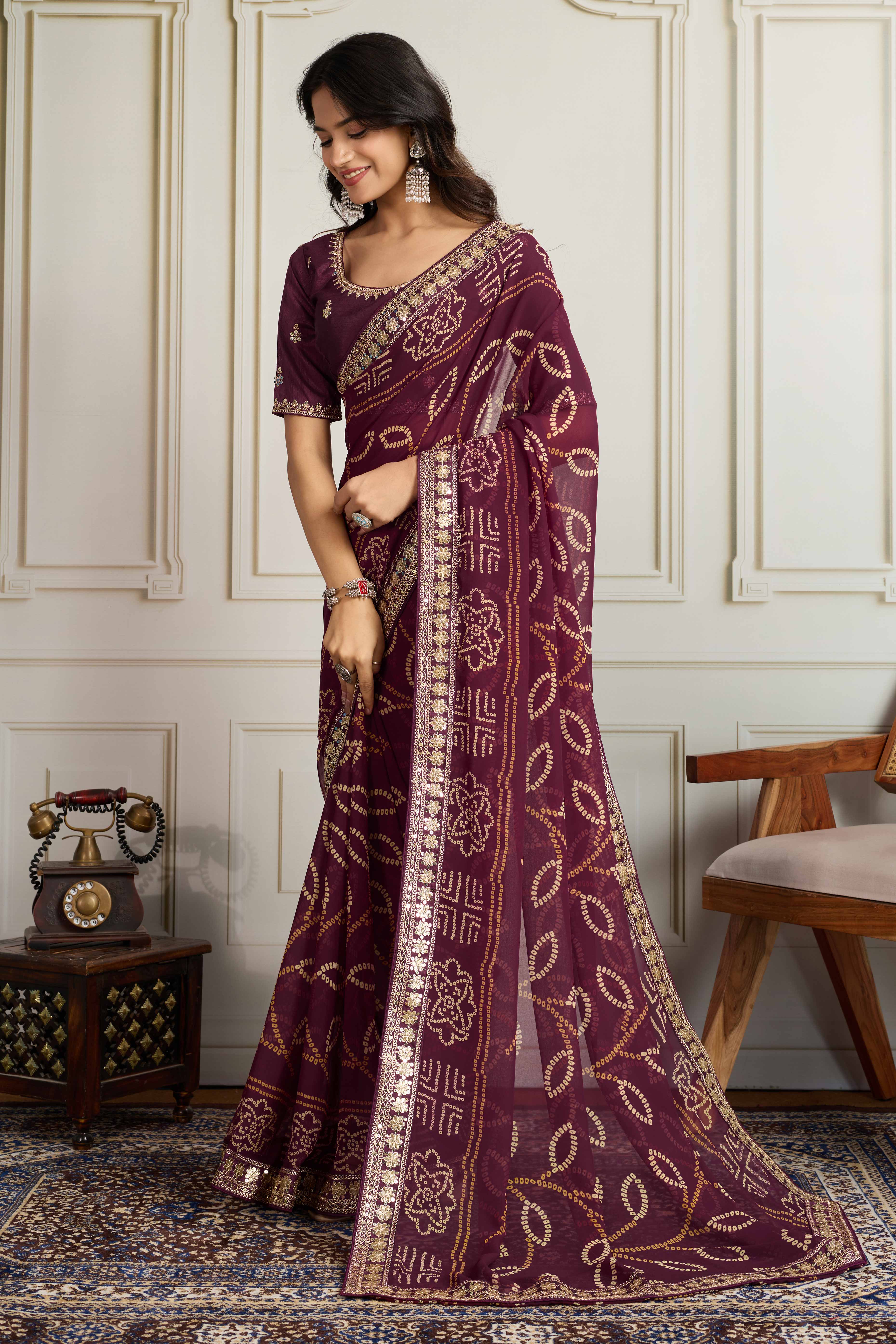 Wine Bandhani Digital Printed Georgette Saree Enhanced With Cording Embroidered Border