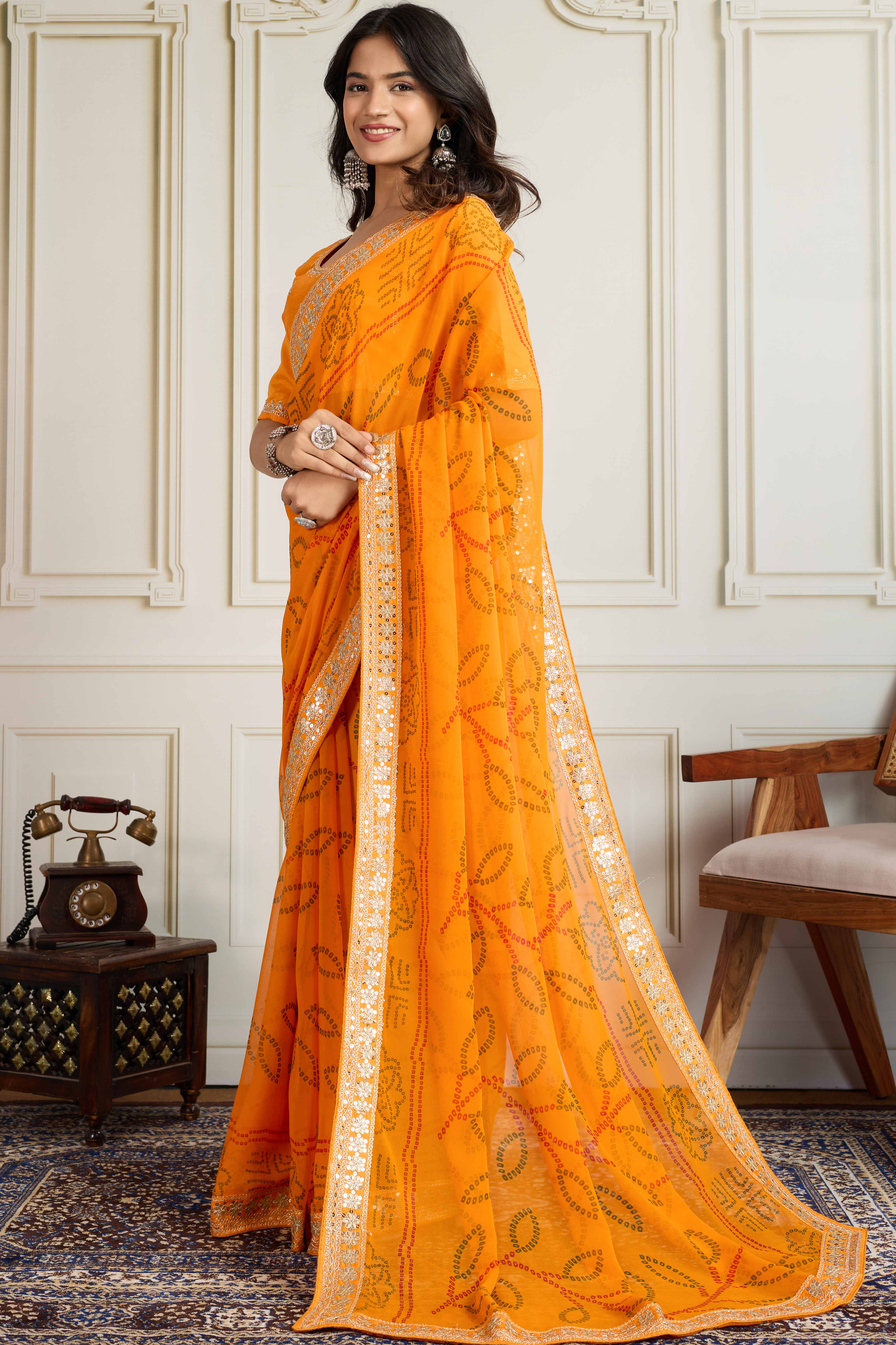 Mustard Bandhani Digital Printed Georgette Saree Enhanced With Cording Embroidered Border