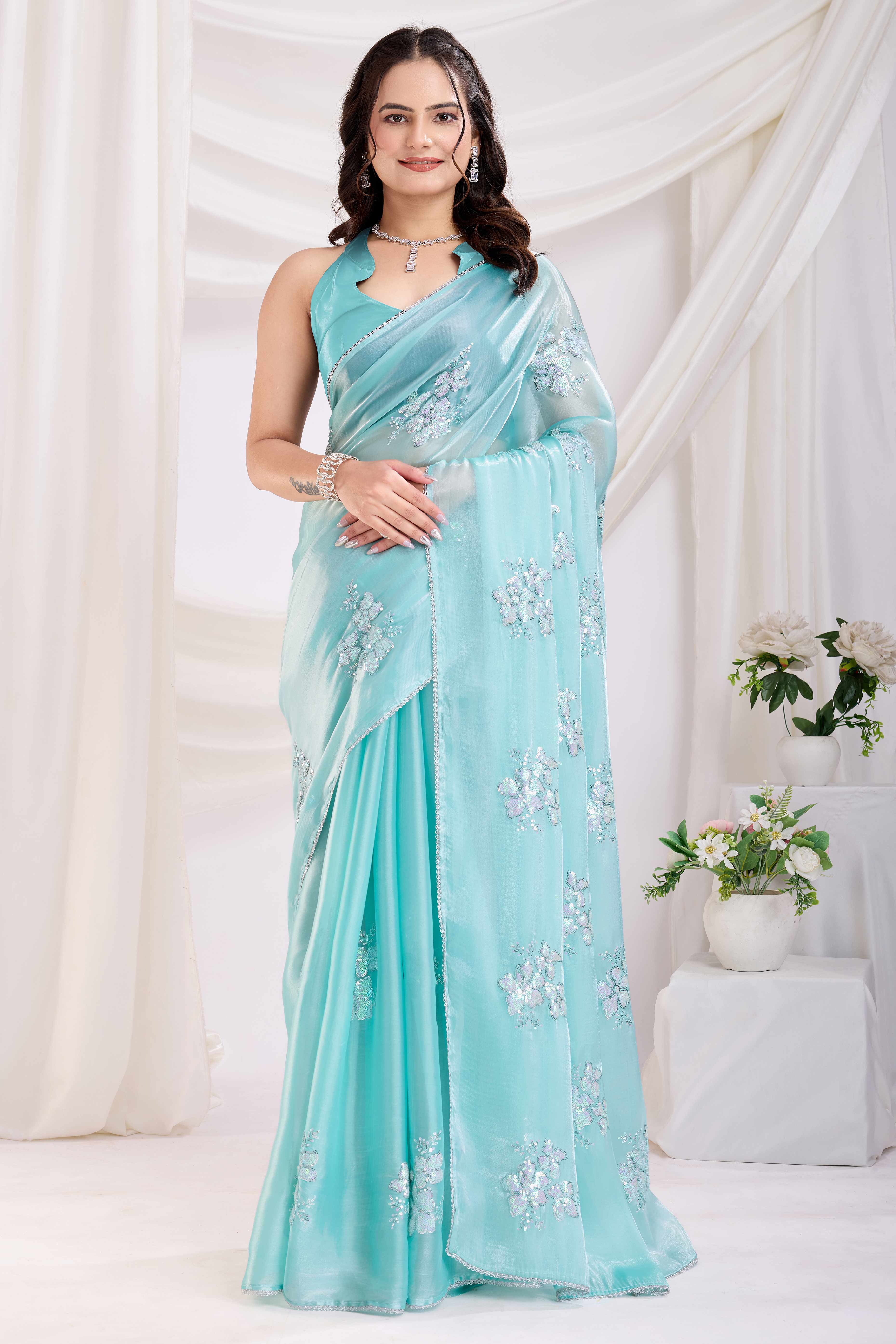 Turquoise Saree With Exquisite Floral Sequins Embroidery On Luxe Jimmy Choo Silk Blend