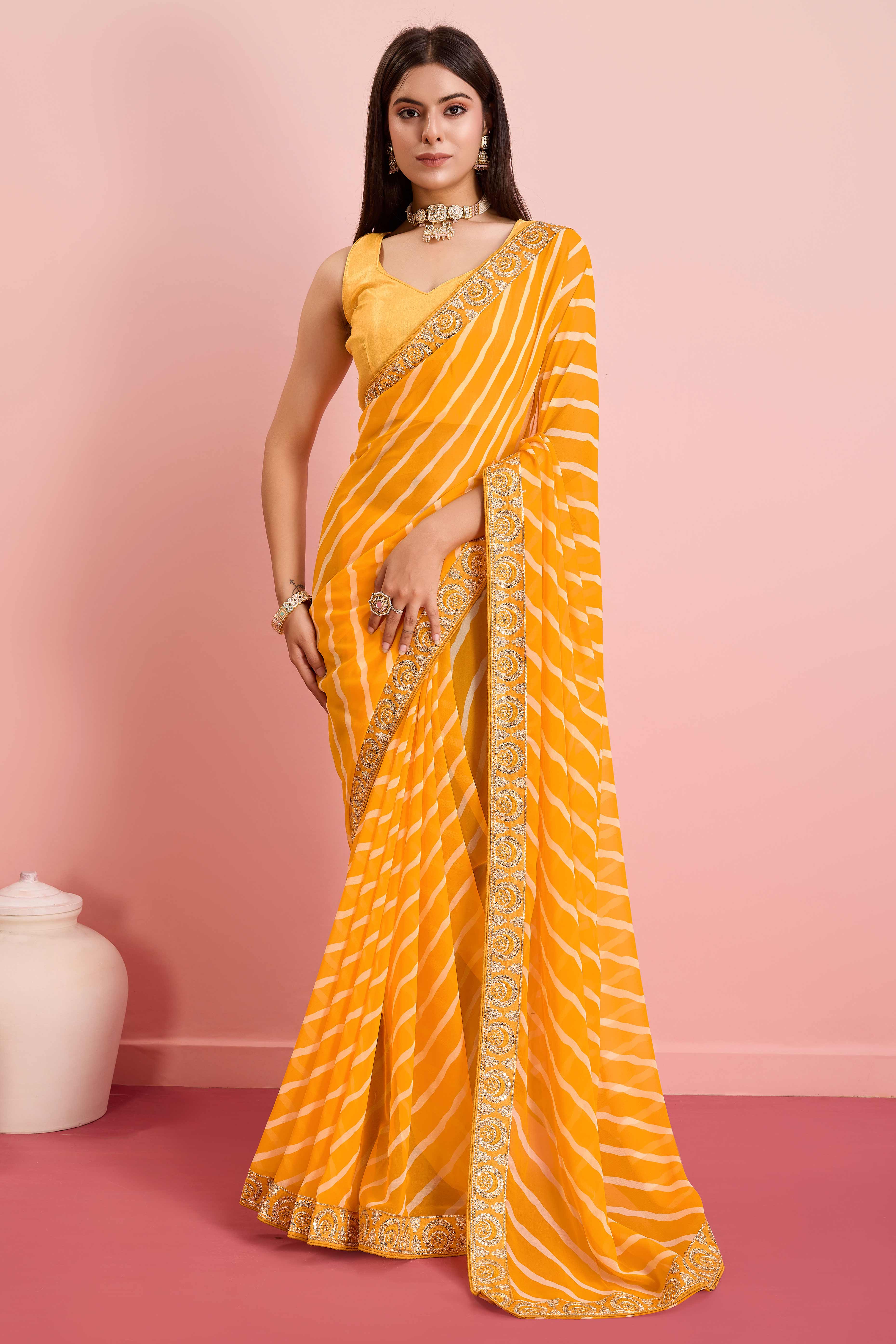 Elegant Yellow Leheriya Printed Saree in Flowing Georgette