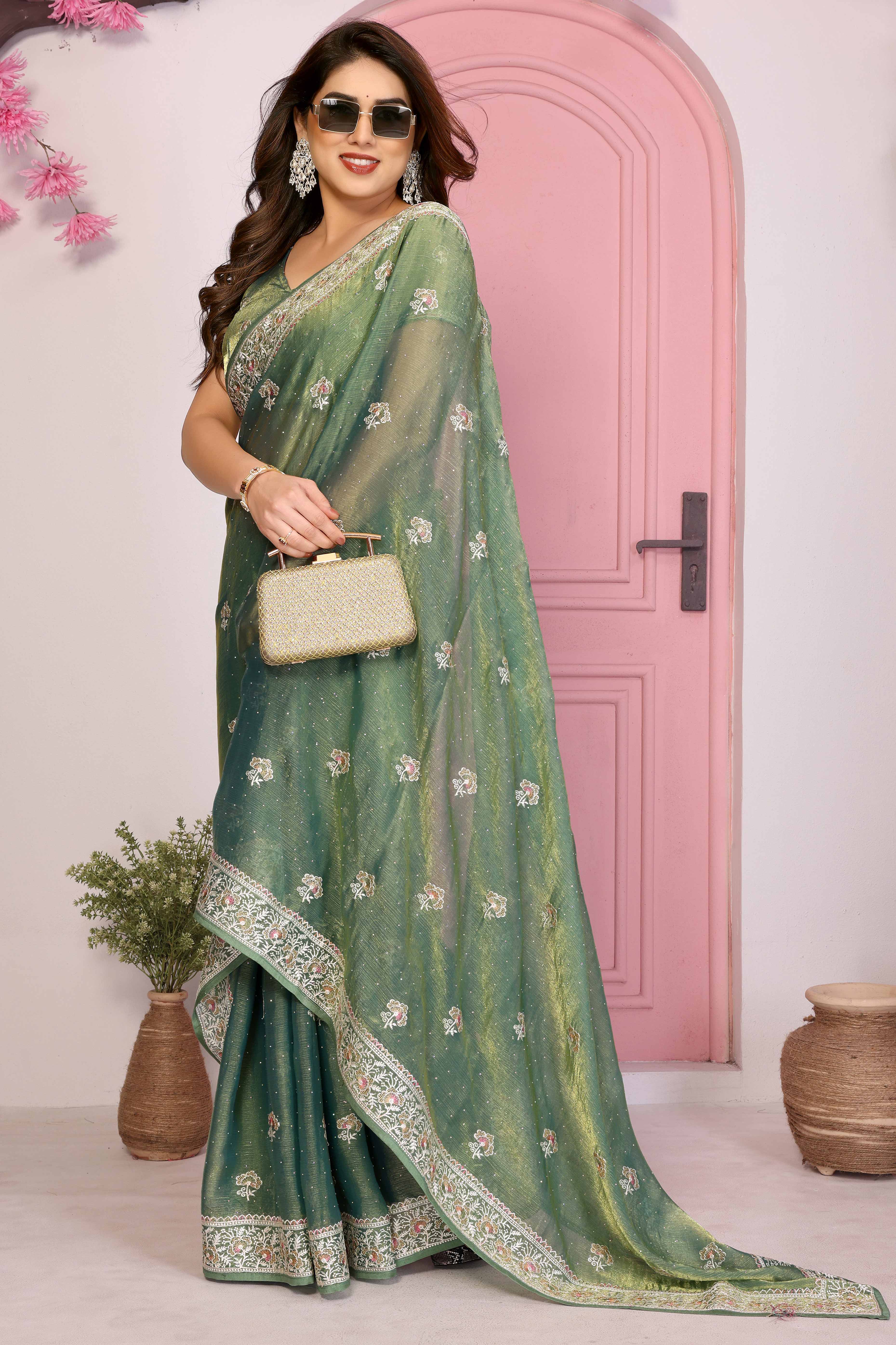 Sea Green Chiffon Saree with Intricate Embroidery and Floral Patterns