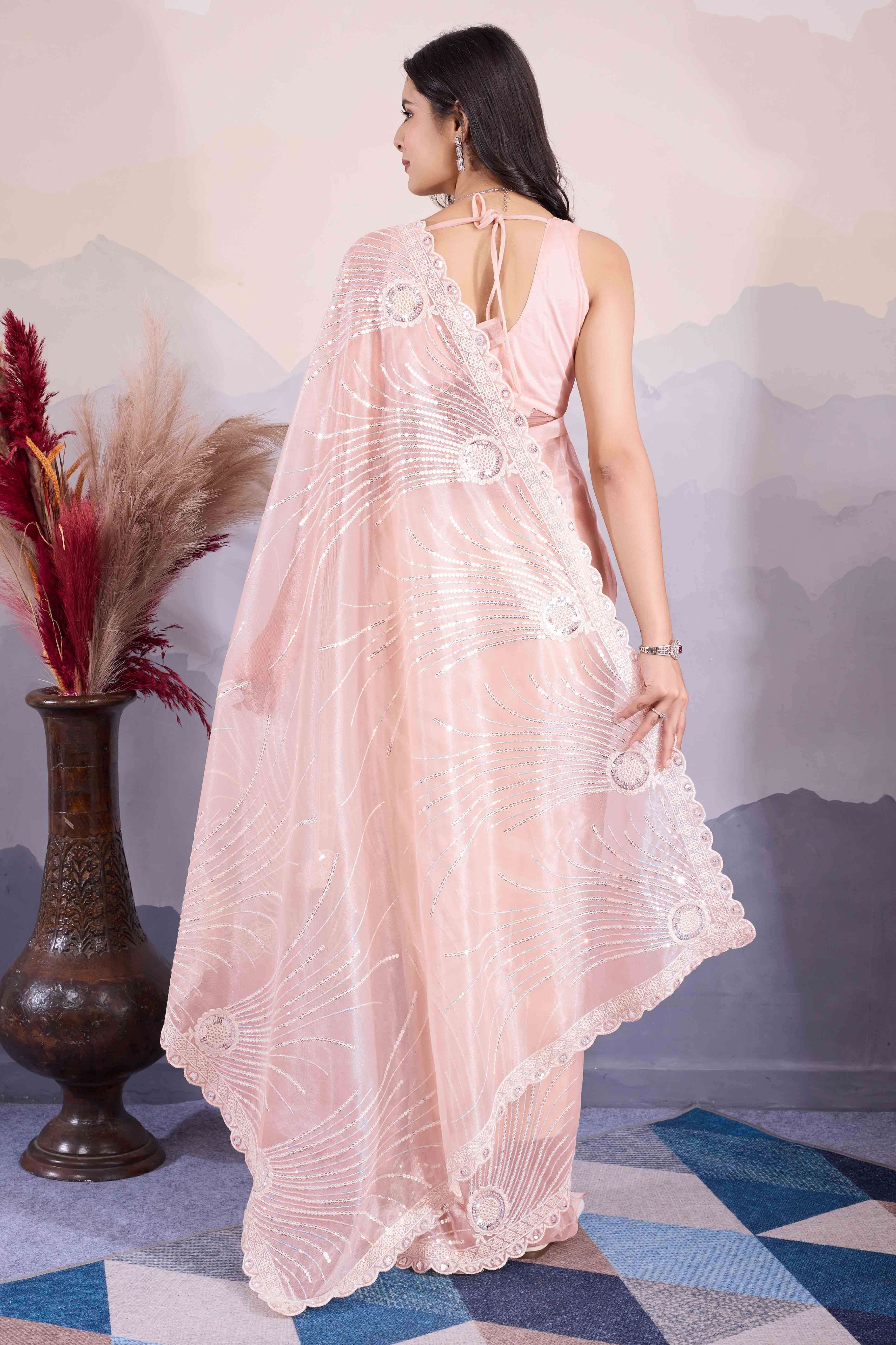Peach Sequins Embroidered Twill Net Saree