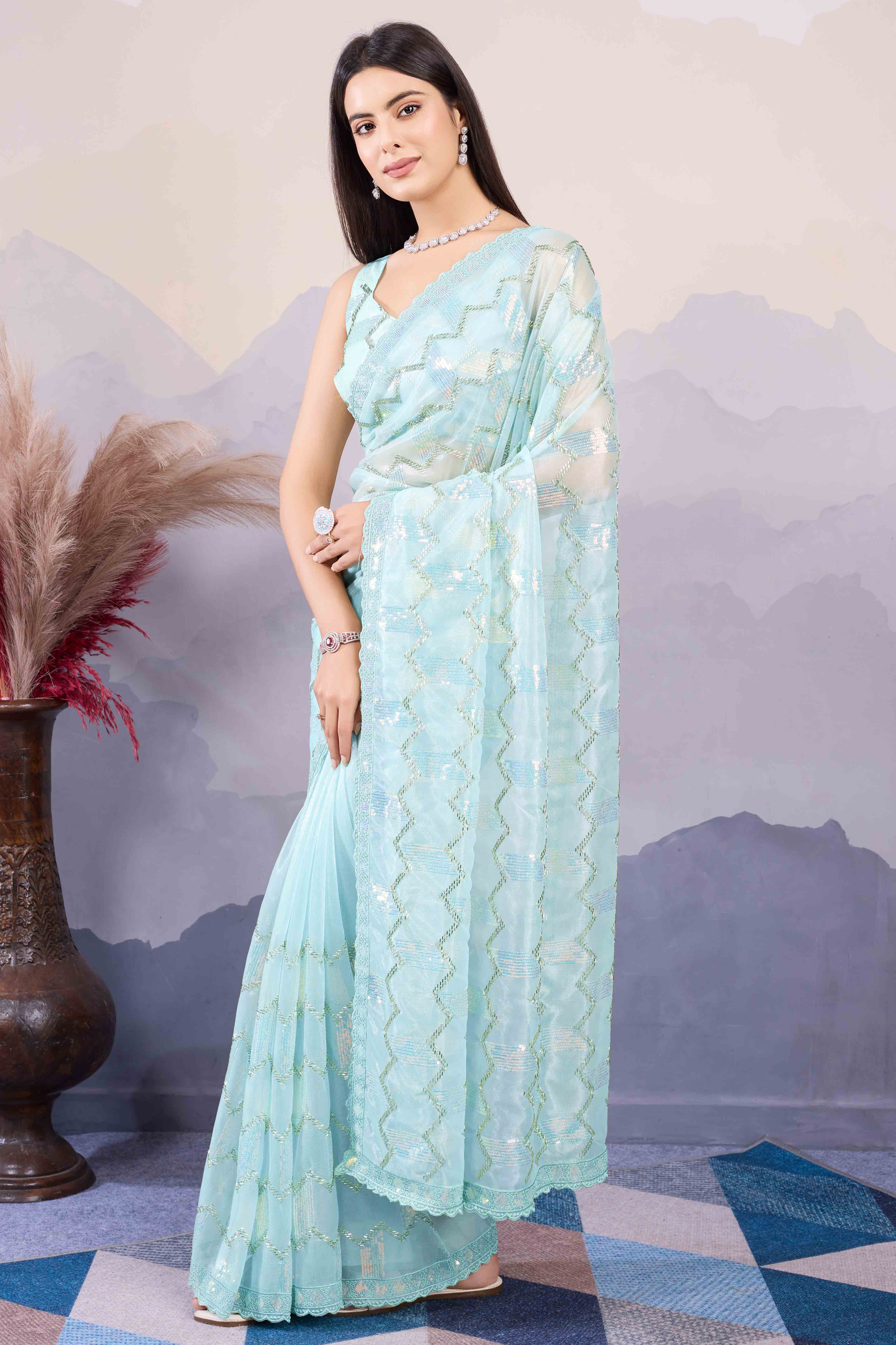 Light Turquoise Sequins Embroidered Twill Net Saree