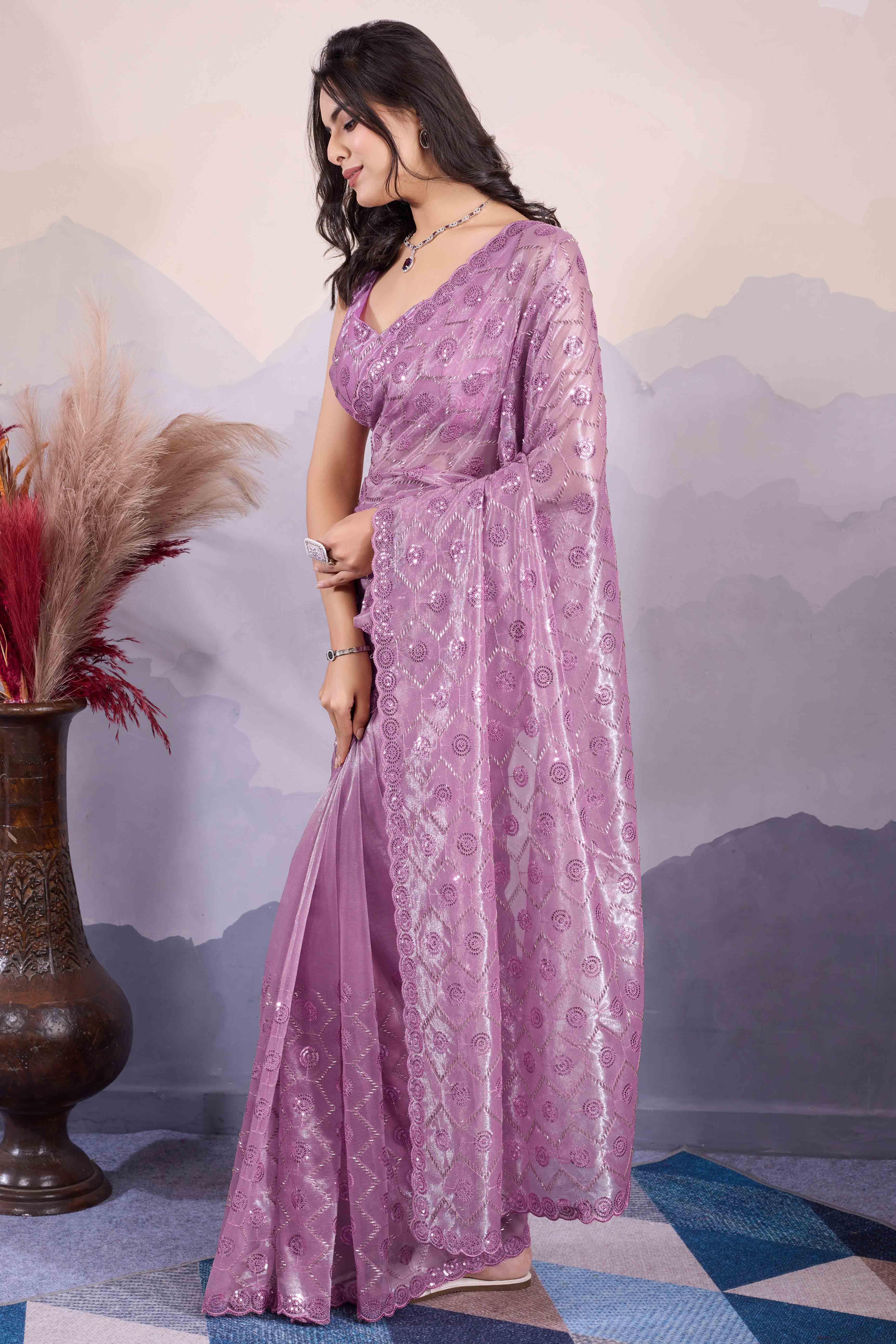 Mauve Sequins Embroidered Twill Net Saree