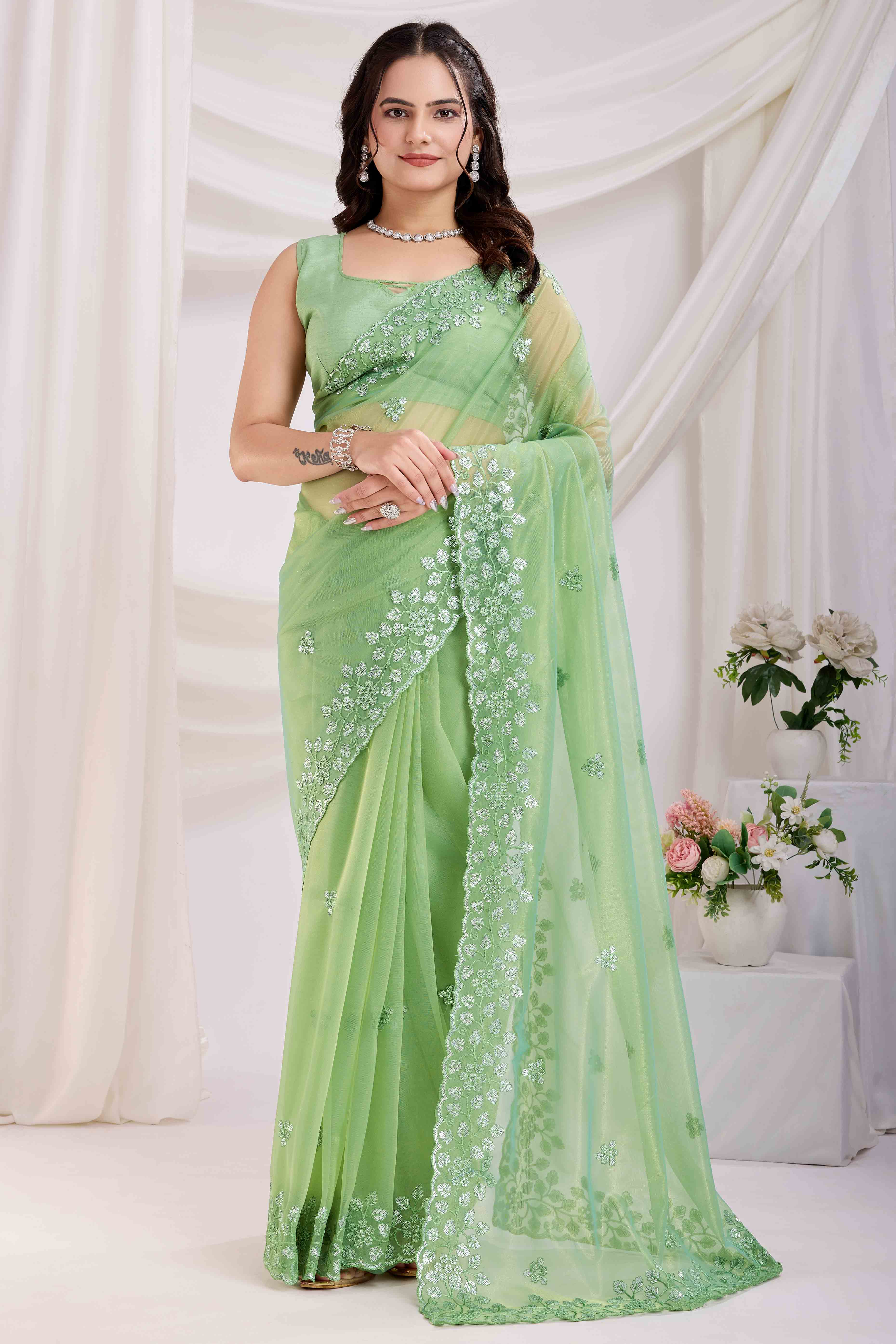 Green Floral Sequins Embroidered Twill Net Saree