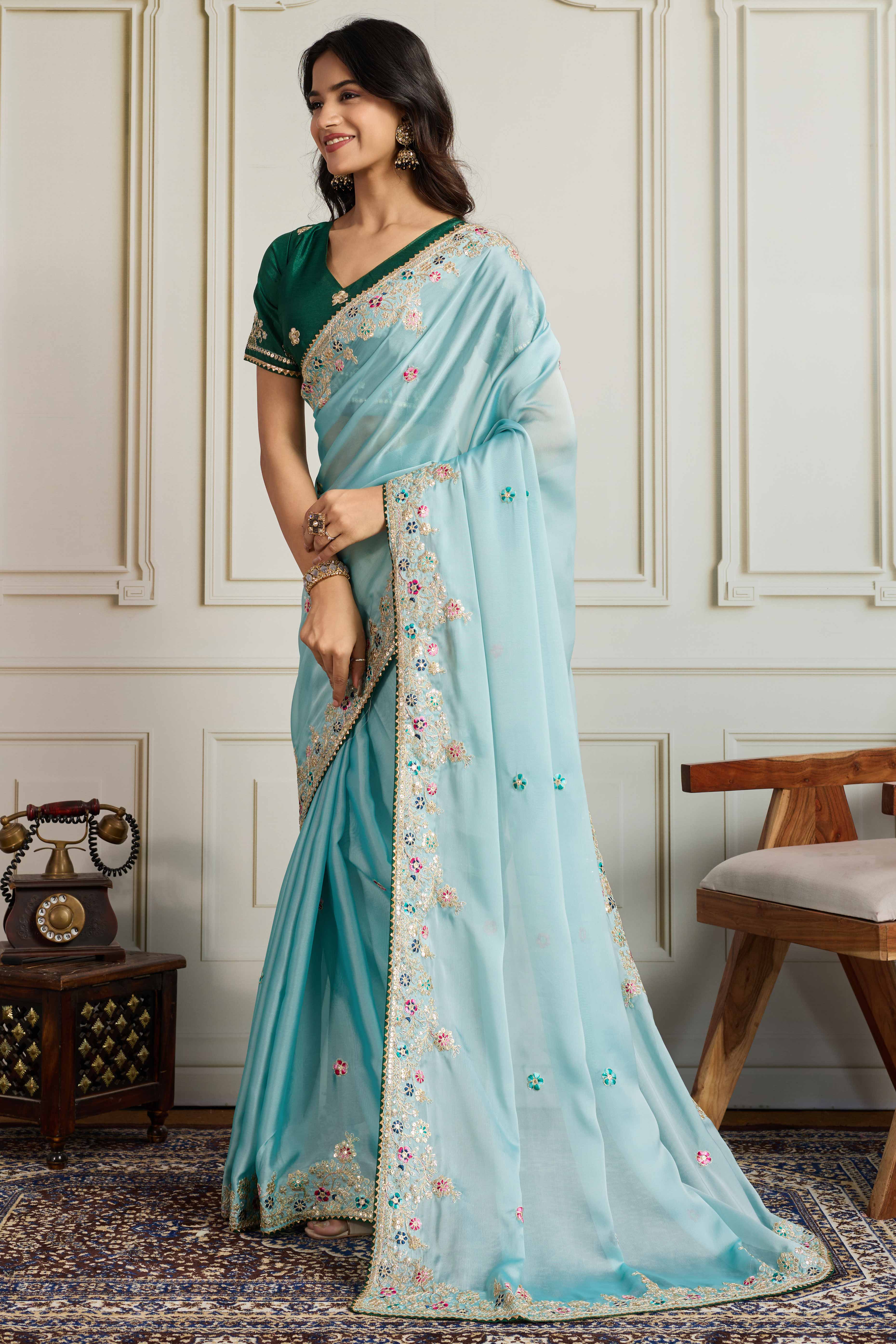 Aqua Blue Star Georgette Party Saree with Sequins and Floral Embroidery